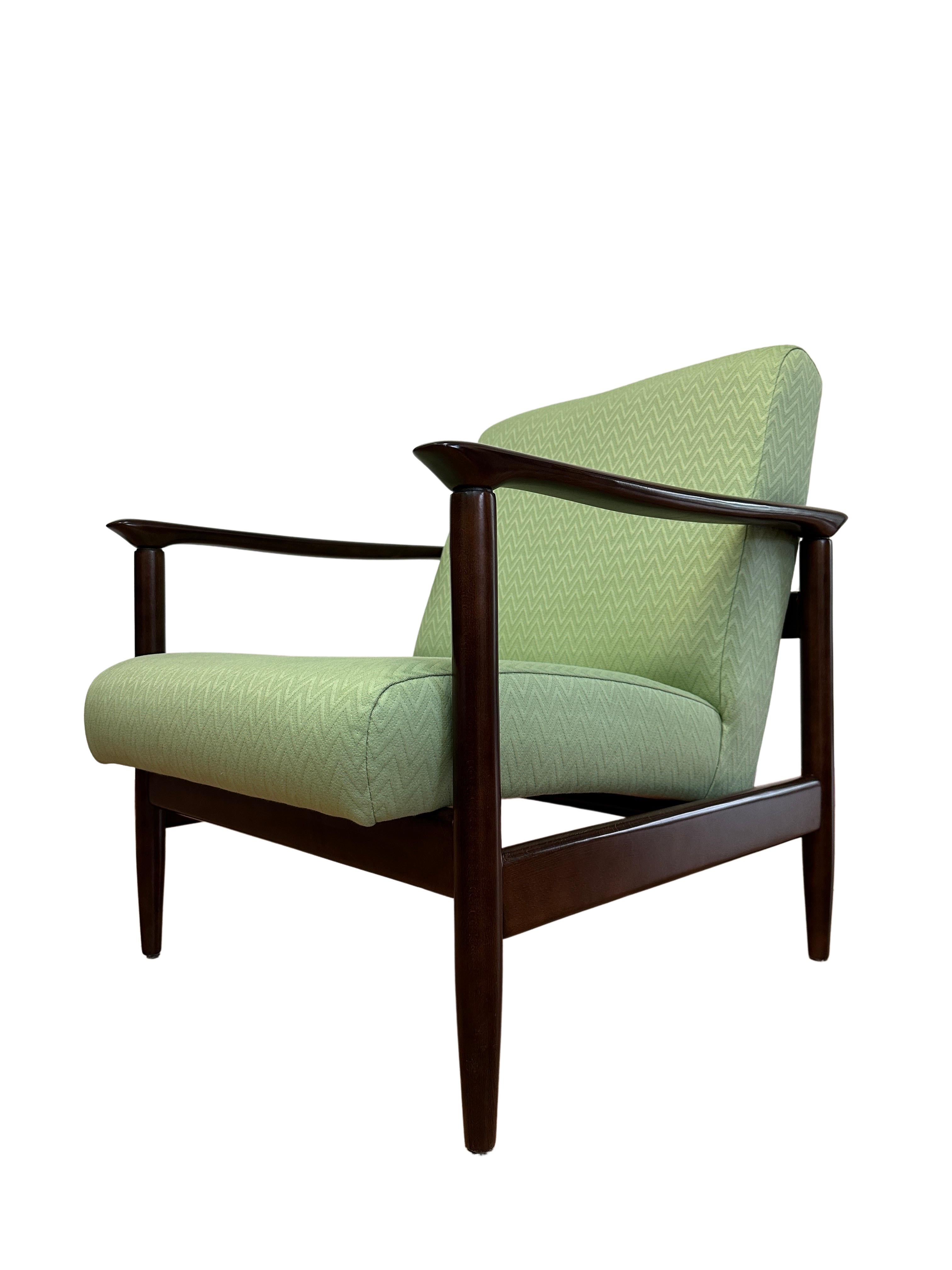 One of the icon of Polish mid-century design, an armchair, designed by Edmund Homa - Polish architect, industrial and interior design designer, professor at the Academy of Fine Arts in Gdansk. 
The armchair has been manufactured by Goscicinska