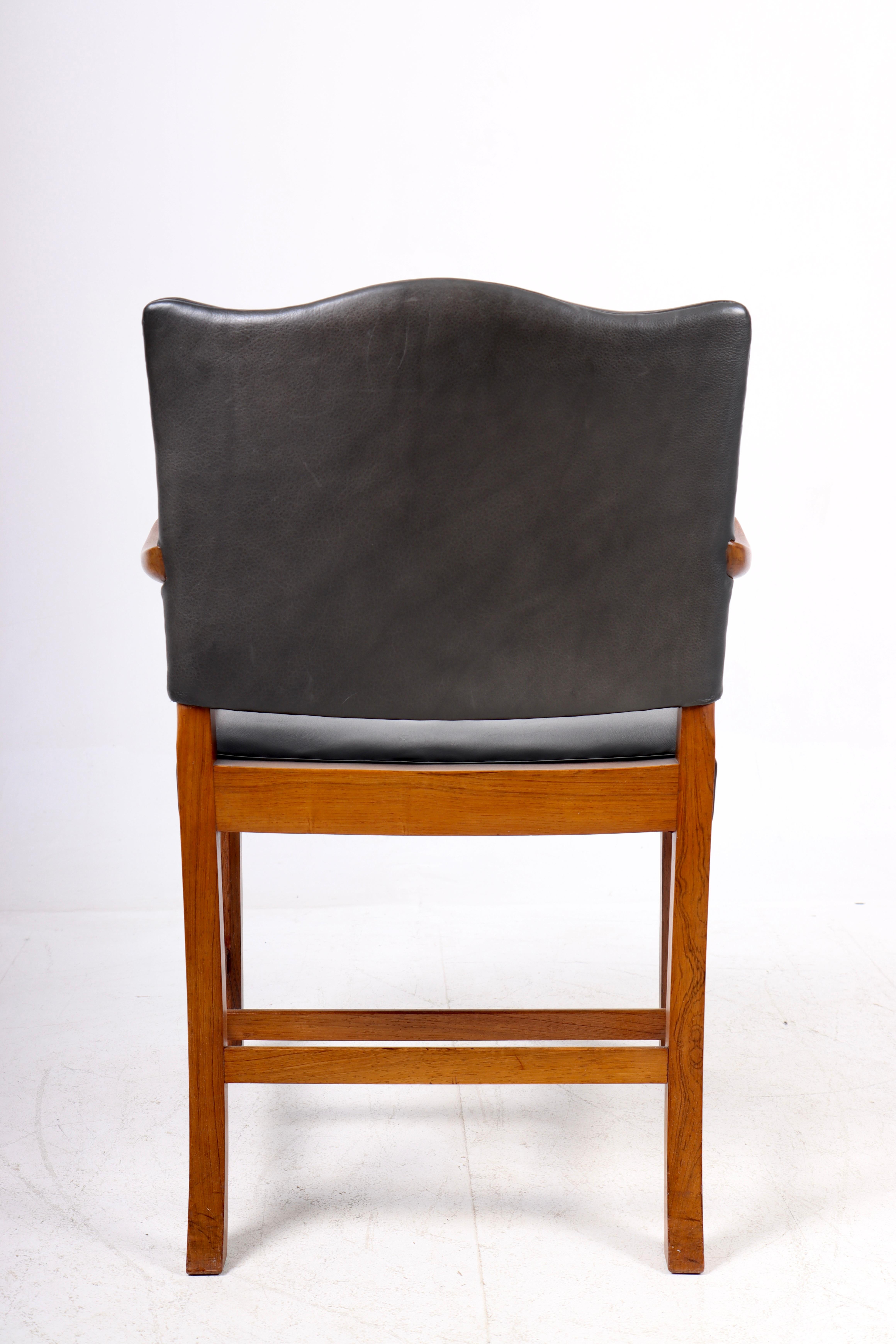 Metà XX secolo Poltrona di metà secolo in palissandro disegnata da Ole Wanscher, design danese, anni '50 in vendita