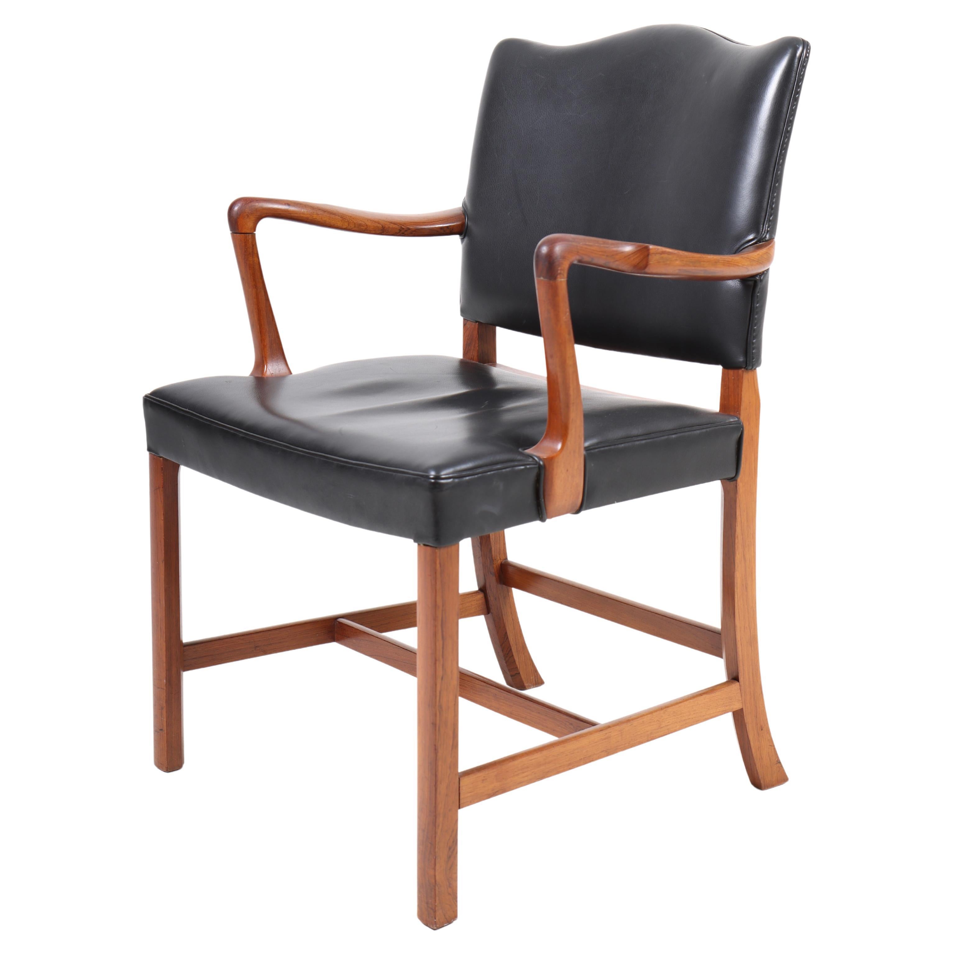 Fauteuil du milieu du siècle en bois de rose conçu par Ole Wanscher, design danois, années 1950