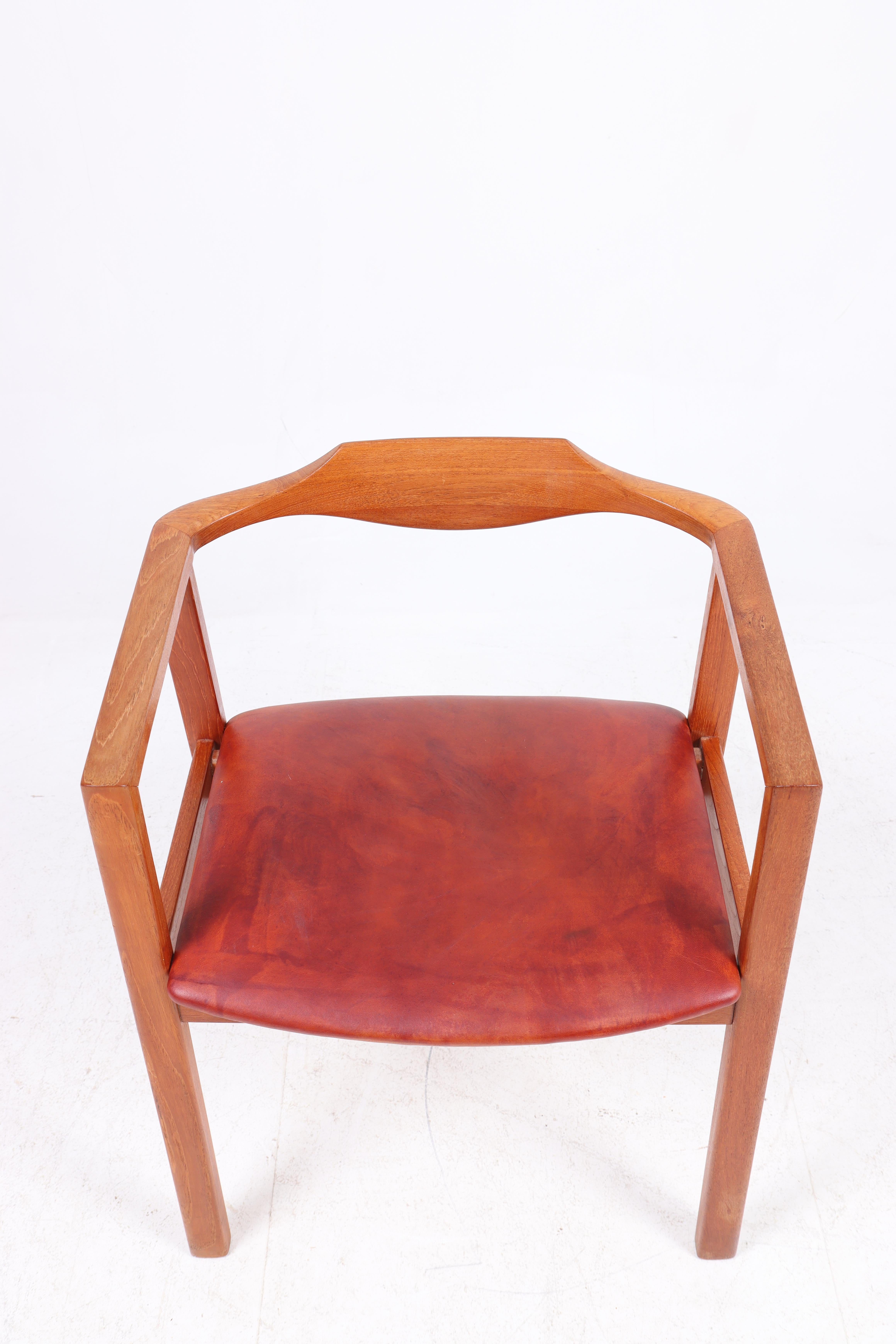 Mid-20th Century Midcentury Armchair in Teak and Patinated Leather, 1950s For Sale