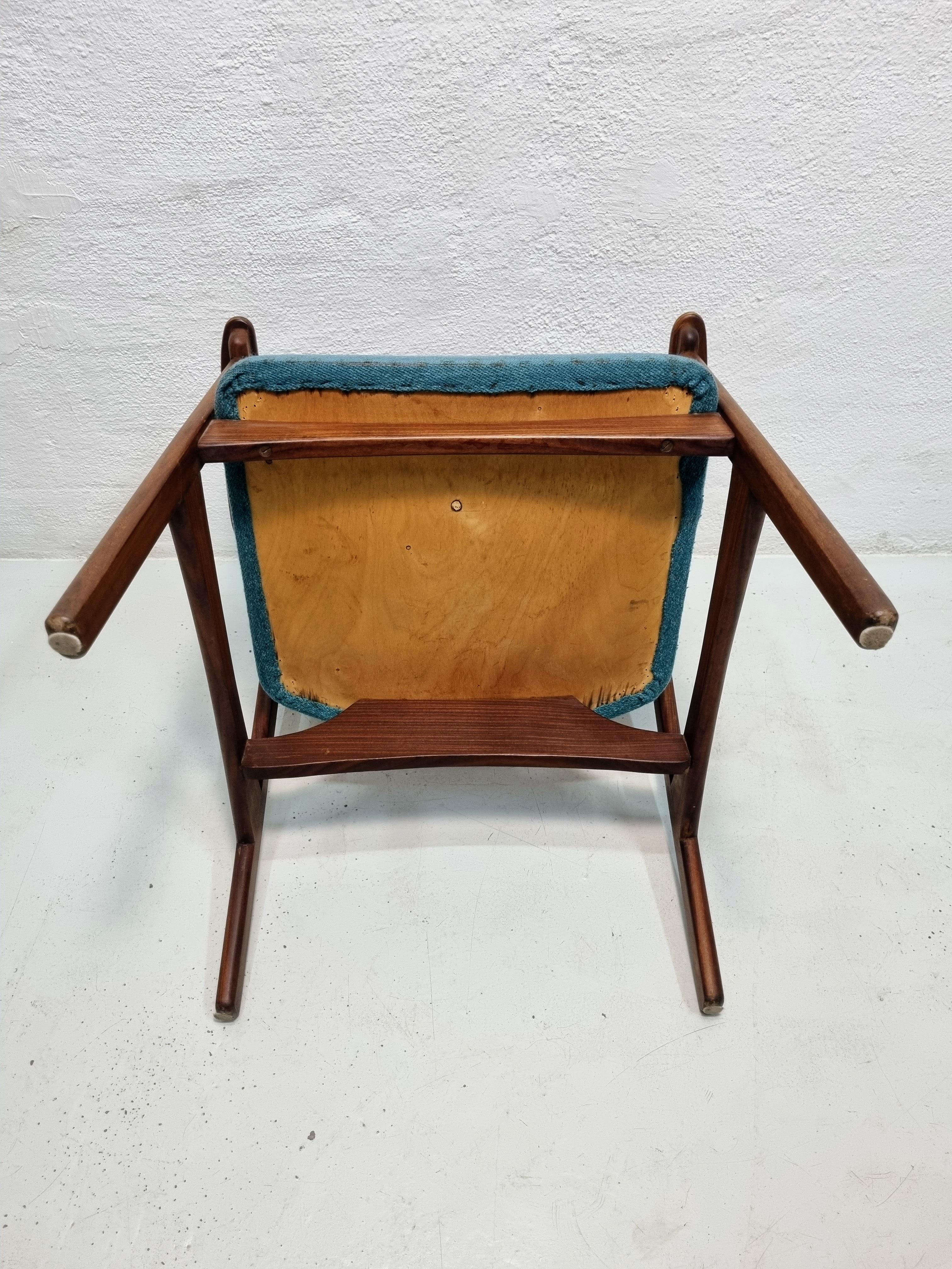 Mid century armchair in teak and rosewood 4