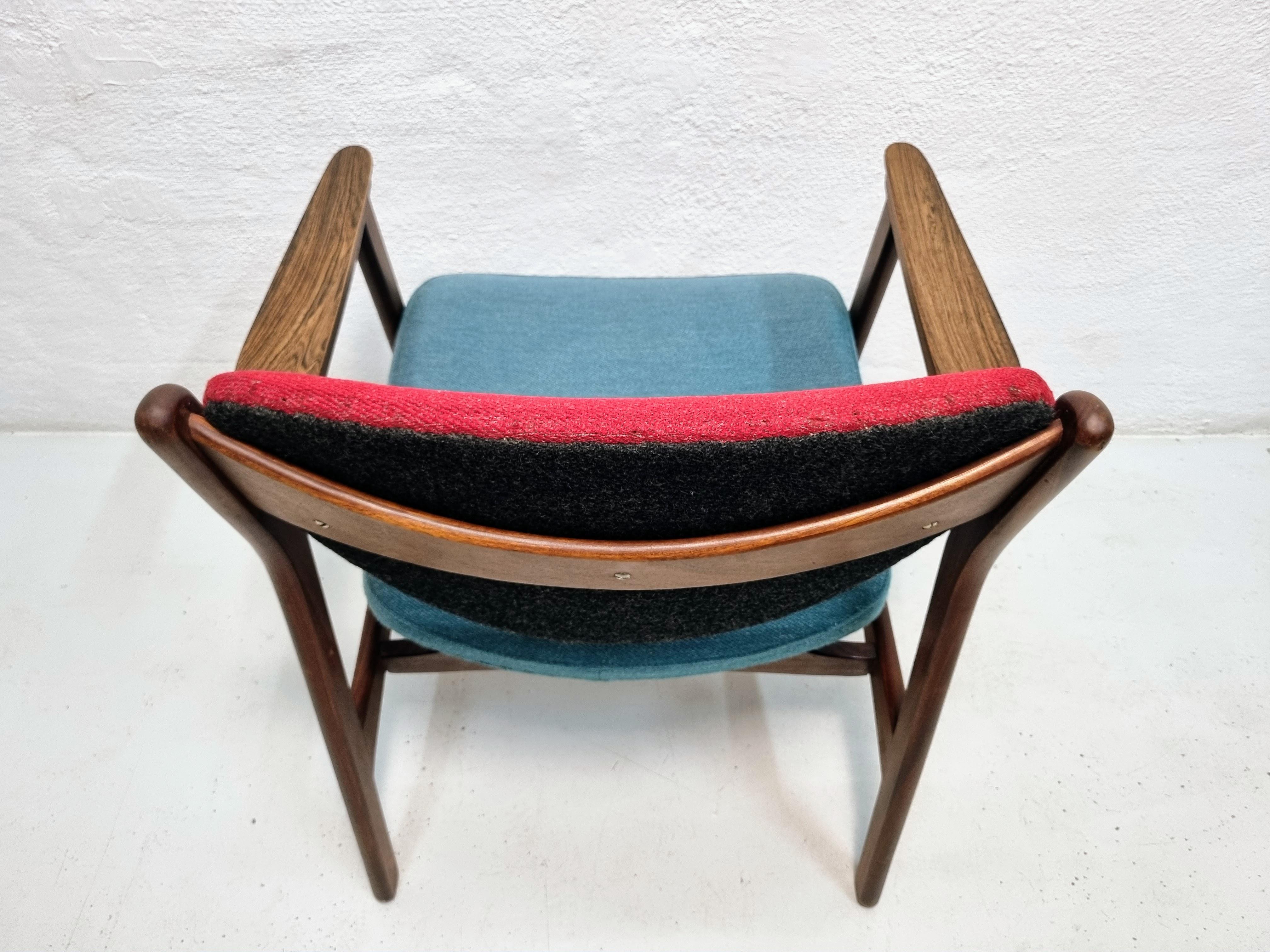 20th Century Mid century armchair in teak and rosewood