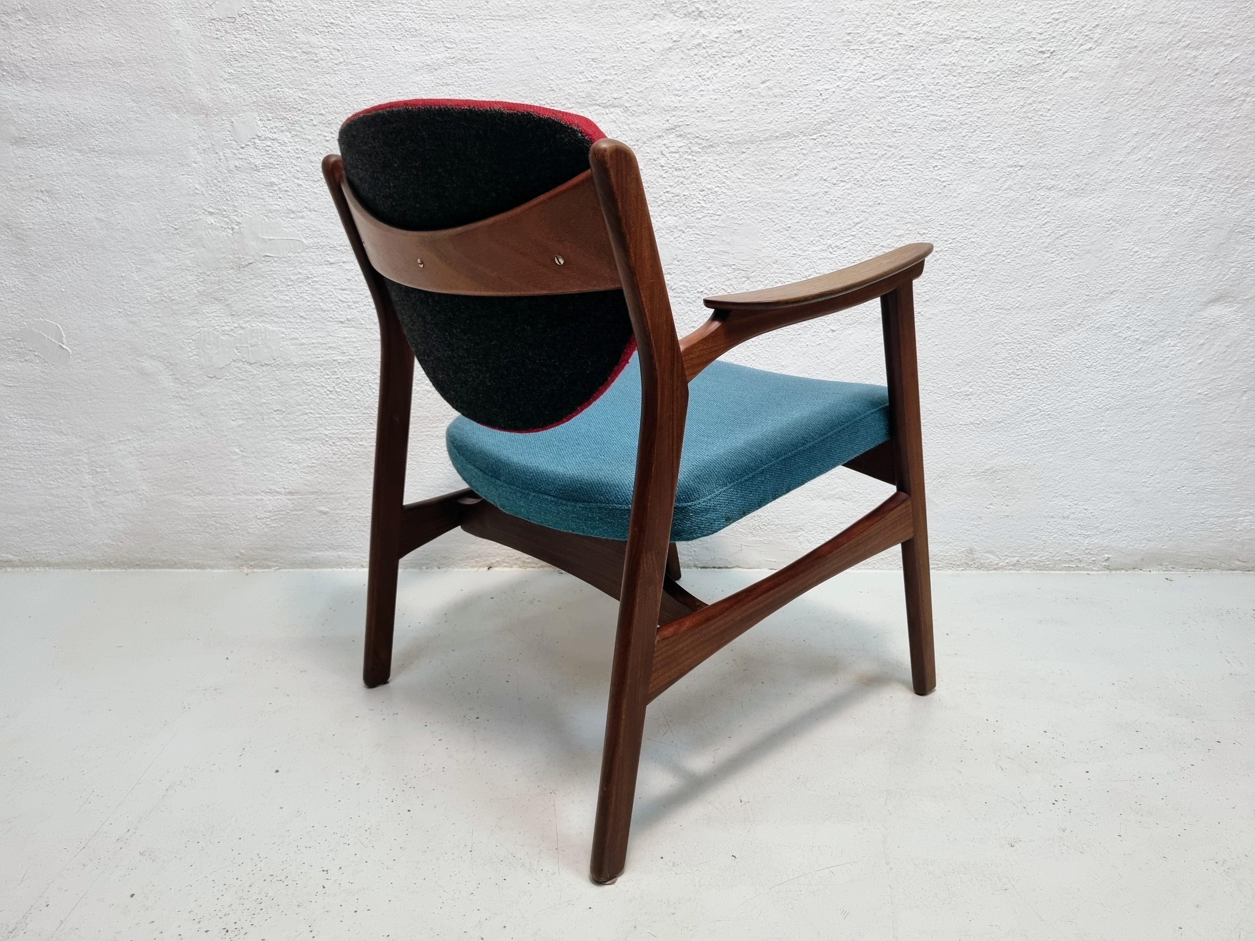 Mid century armchair in teak and rosewood 1