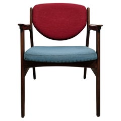 Mid century armchair in teak and rosewood