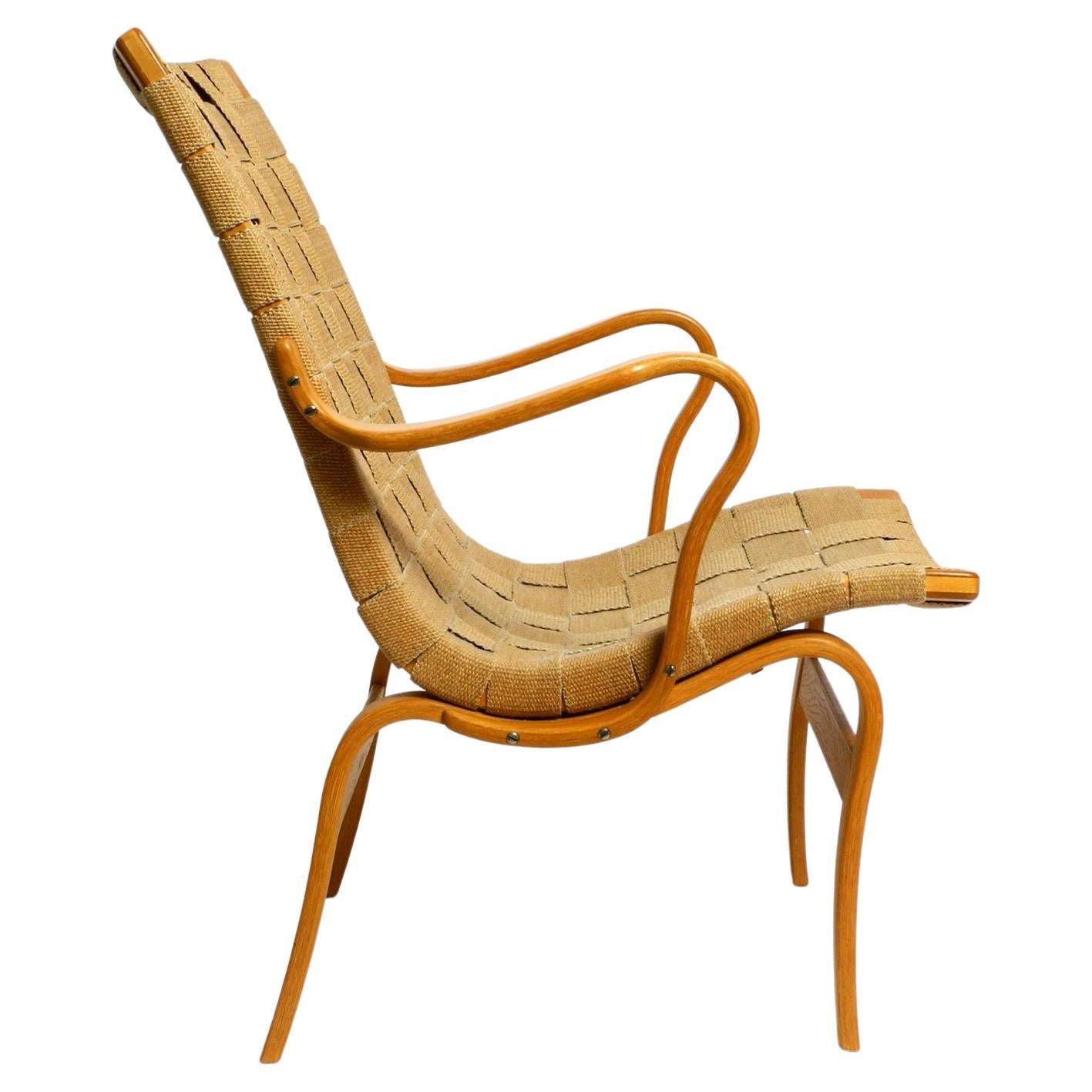 Mid Century armchair model "Eva" by Bruno Mathsson made of birch and hemp weave For Sale