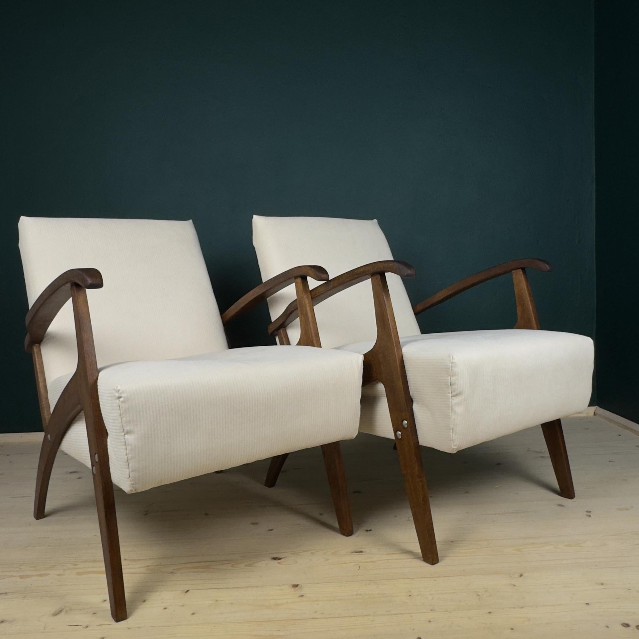 Beautiful pair of vintage armchair made in Yugoslavia in the 1970s.

Very good condition. Updated upholstery.

Dimensions:
Width: 60 cm / 23.65 inches
Height: 80 cm / 31.5 inches
Depth: 78 cm / 30.7 inches
Seat height: 42 cm / 16.5 inches

We offer