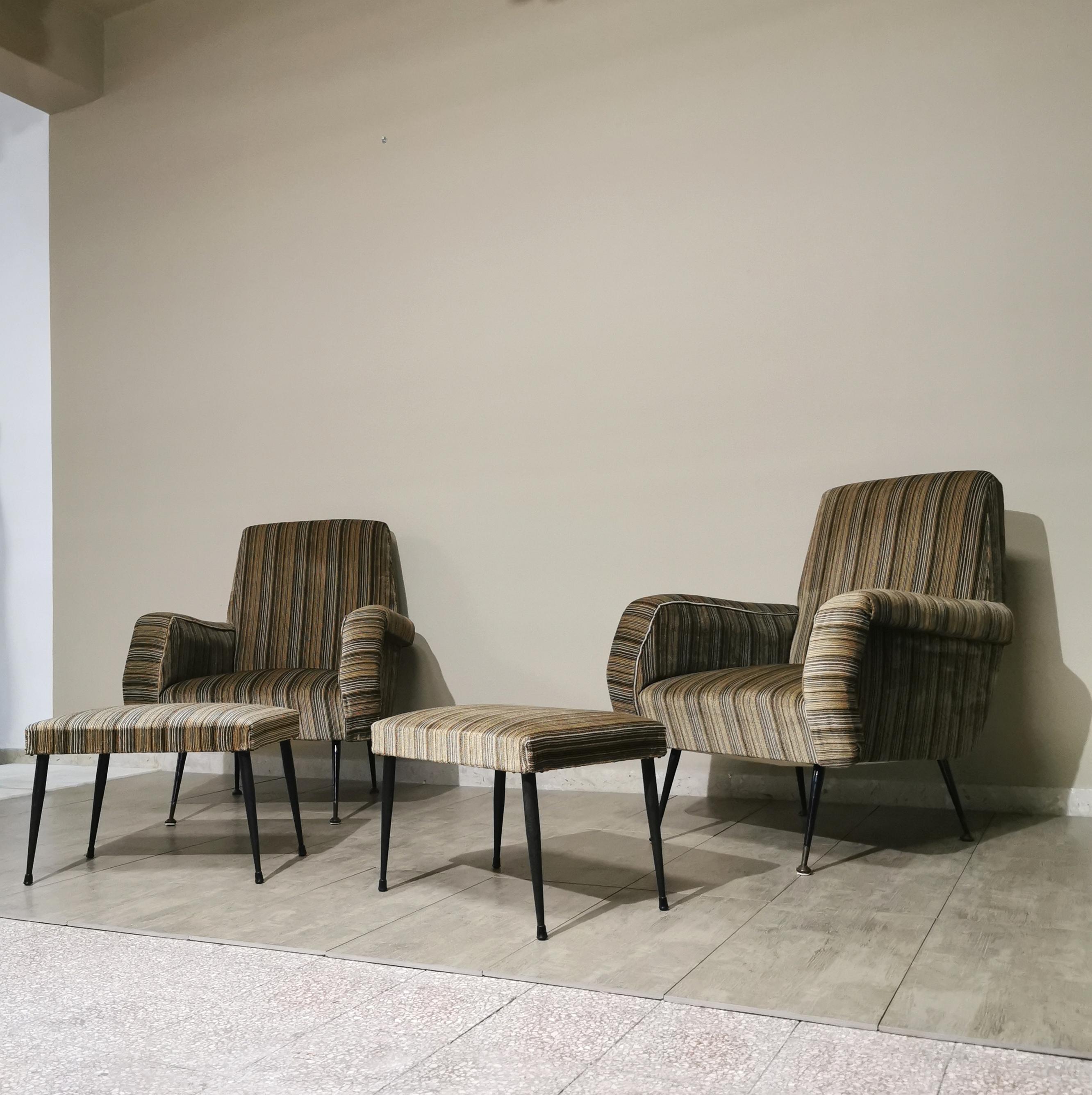 Set of 2 armchairs and 2 footrests by Gigi Radice for Minotti upholstered in multicolored smooth velvet with feet in black lacquered metal and brass, Italian production of the 1950s.