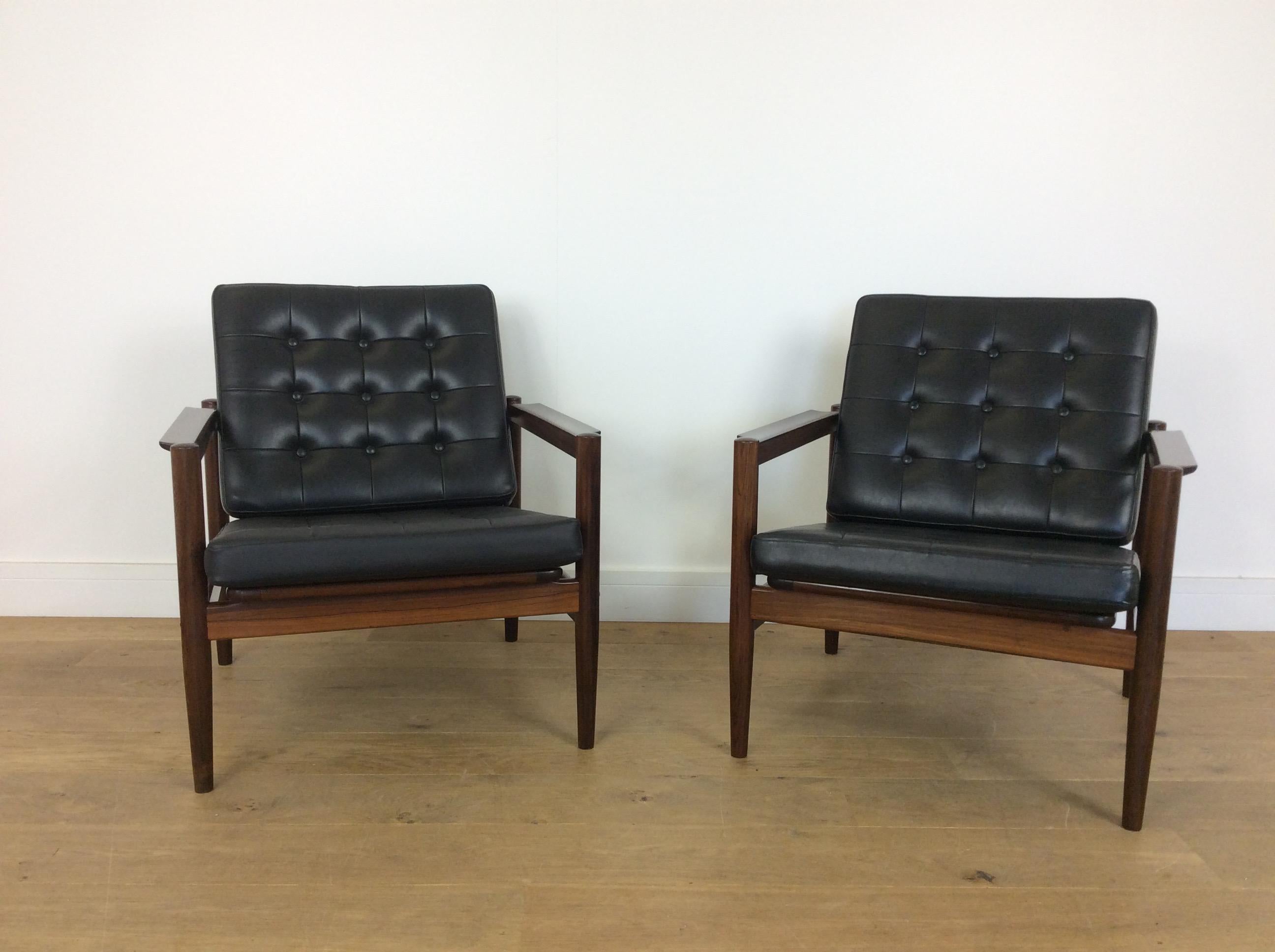 A pair of mid century armchairs.
An impressive pair of rosewood armchairs with button leather pads.
Designed by Borge Jensen & Sonner for Bernstorffsminde Mobelfabrik.
73 cm H 67 cm W 72 cm D seat H 40 cm seat D 50 cm
Danish, circa 1960.