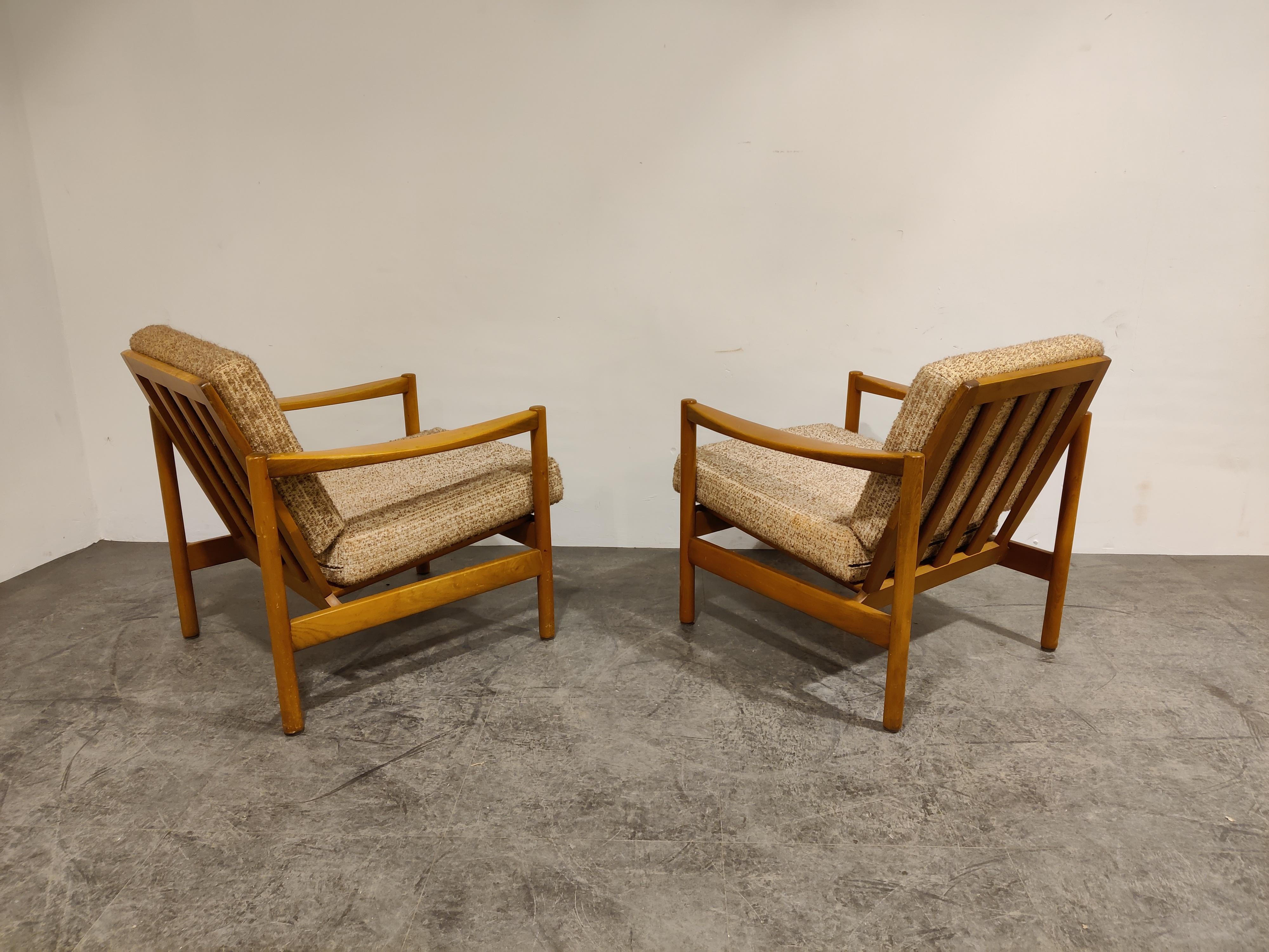 These elegant armchair by Knoll Antimott.

Beautifully crafted beech wooden frames with the original fabric cushions.

Condition: frames are in original conditionwith normal wear, sturdy. - Fabric is also original and has some stains. But still