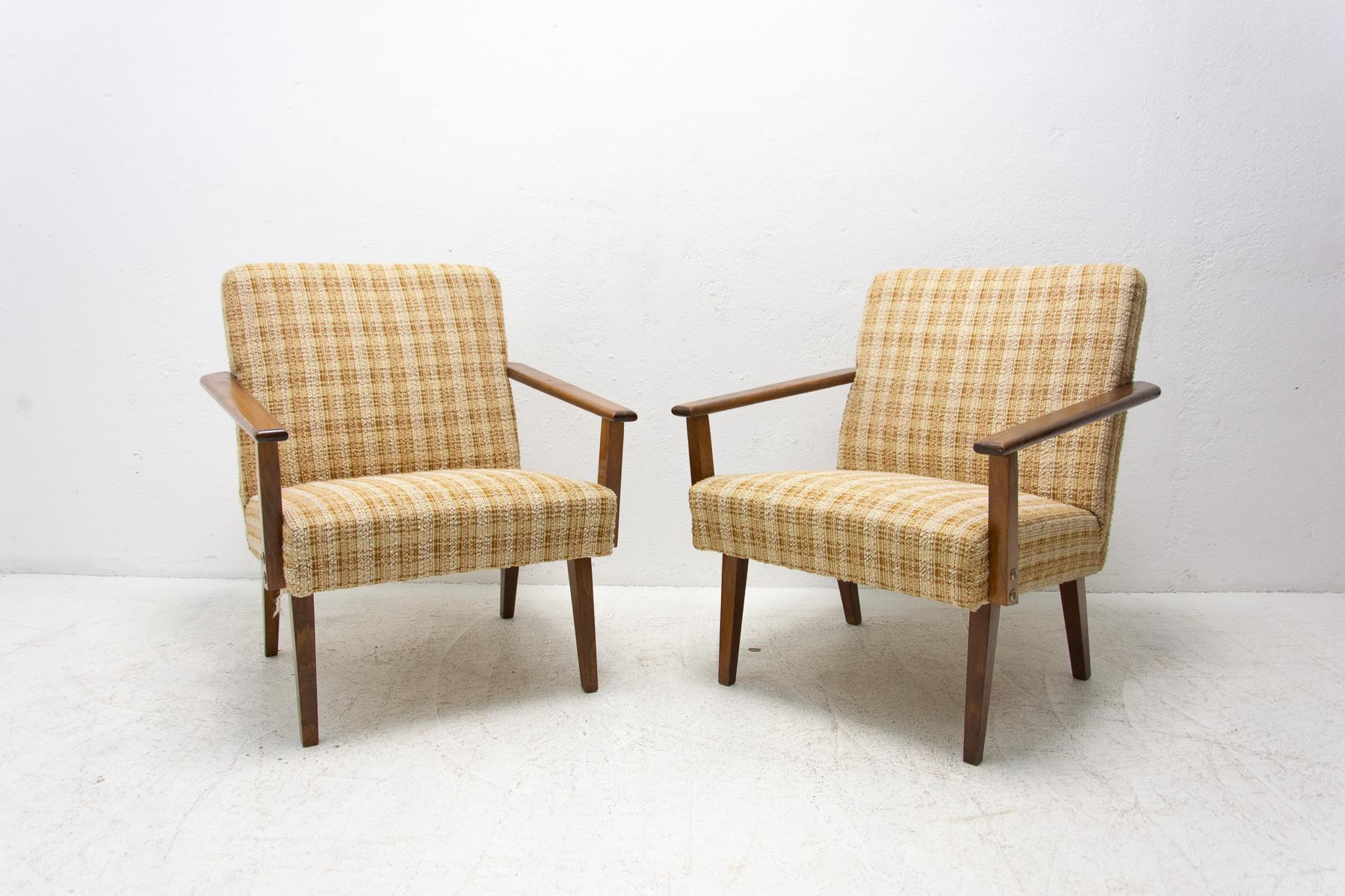 These Czechoslovak lounge chairs were made by Tatra Nabytok in the former Czechoslovakia in the 1960´s. Attribute to František Jirák.
The armchairs have the original structure of dark stained beech wood. They are in good Vintage condition, showing