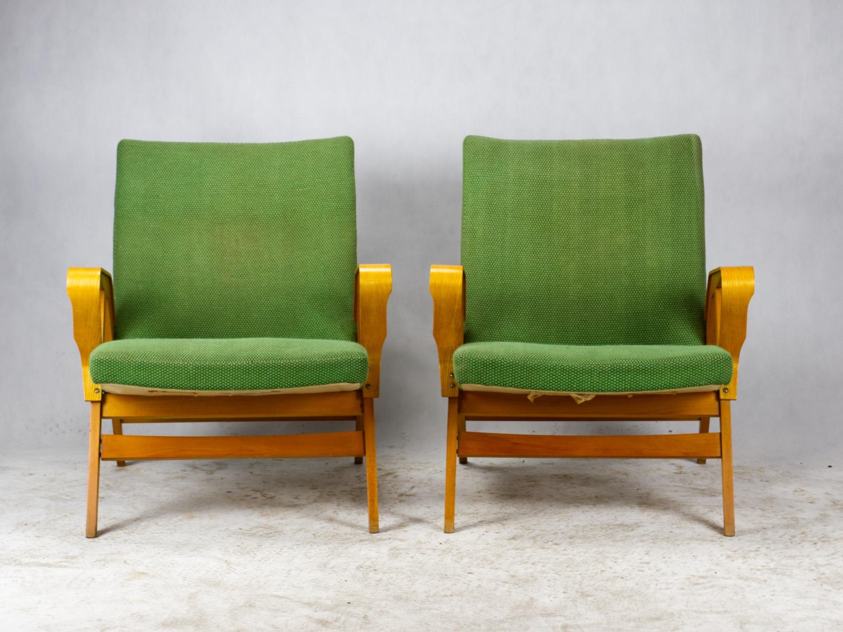 Armchairs produced by Tatra Nábytok Czechoslovakia, in the 1960s in original upholstery.
The chairs are in a good vintage condition, upholstery is a faded and wood is in good condition.
Very comfortable larger model with original labels.
   
  