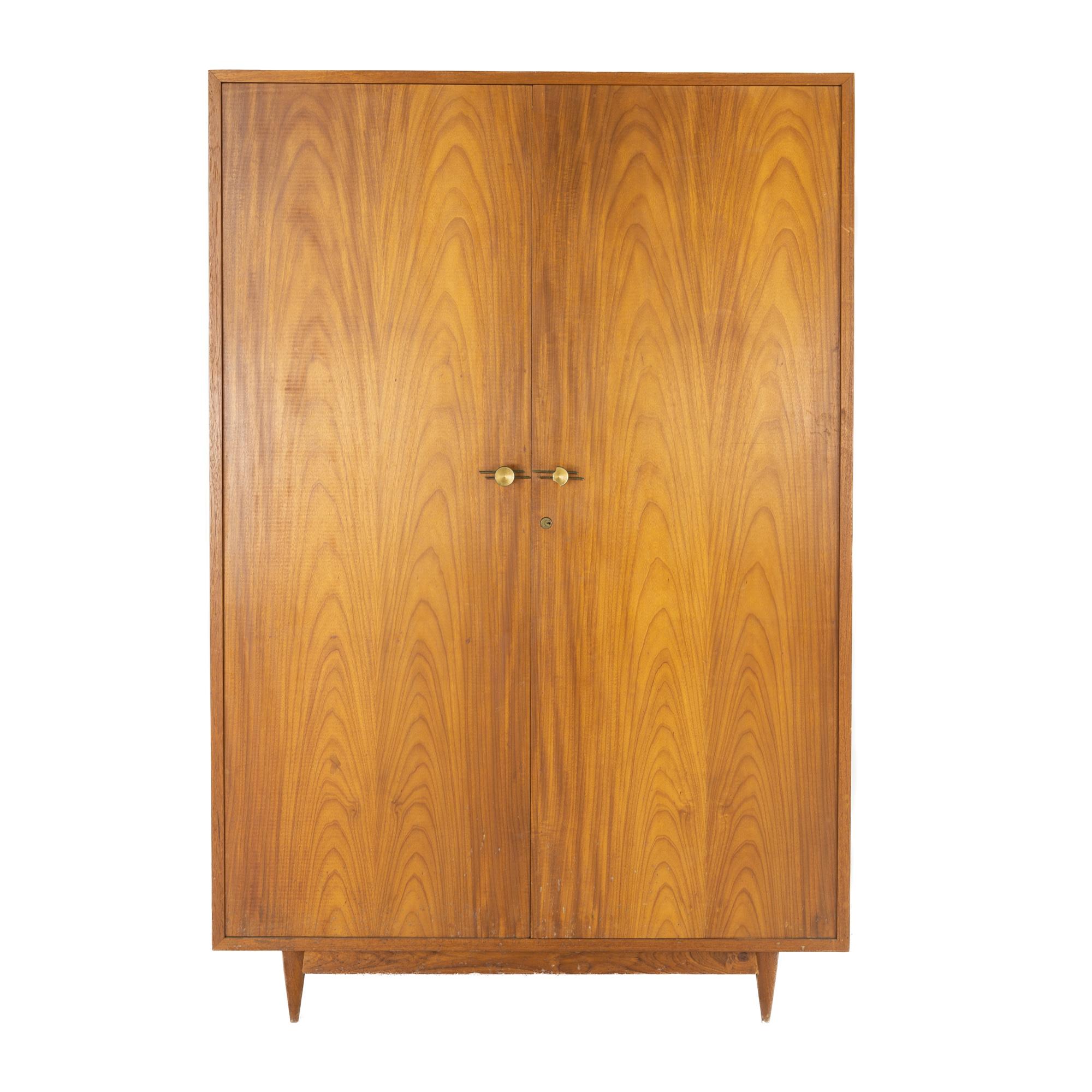 Mid Century armoire

This armoire measures: 48 wide x 25 deep x 72 inches high

All pieces of furniture can be had in what we call restored vintage condition. That means the piece is restored upon purchase so it’s free of watermarks, chips or