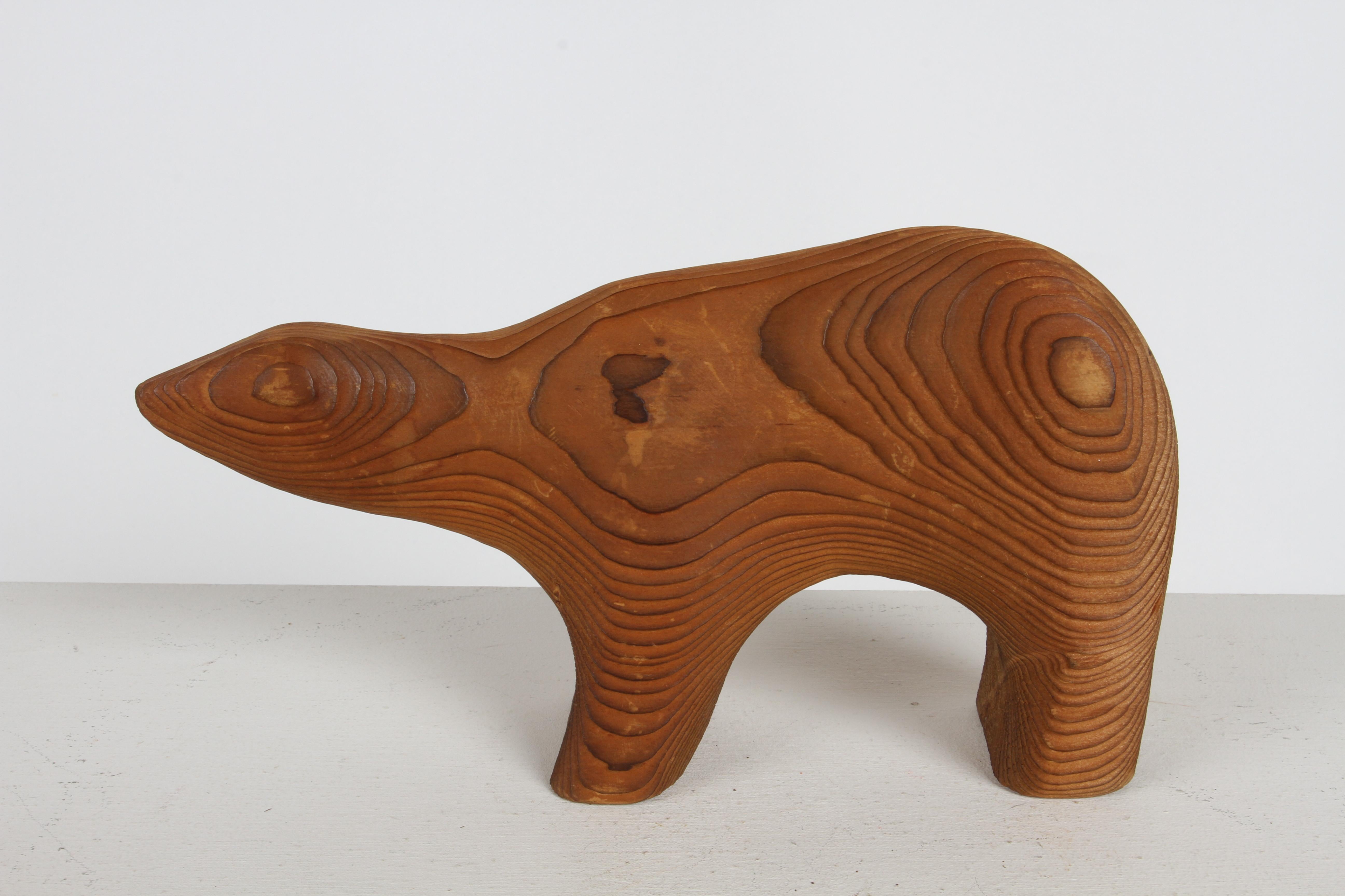 Mid-Century - in the style of Arne Tjomsland - Norway, hand carved bear cub figure sculpture made from cedar and artist signed CERD Canada. Light scuffs, water stain. 