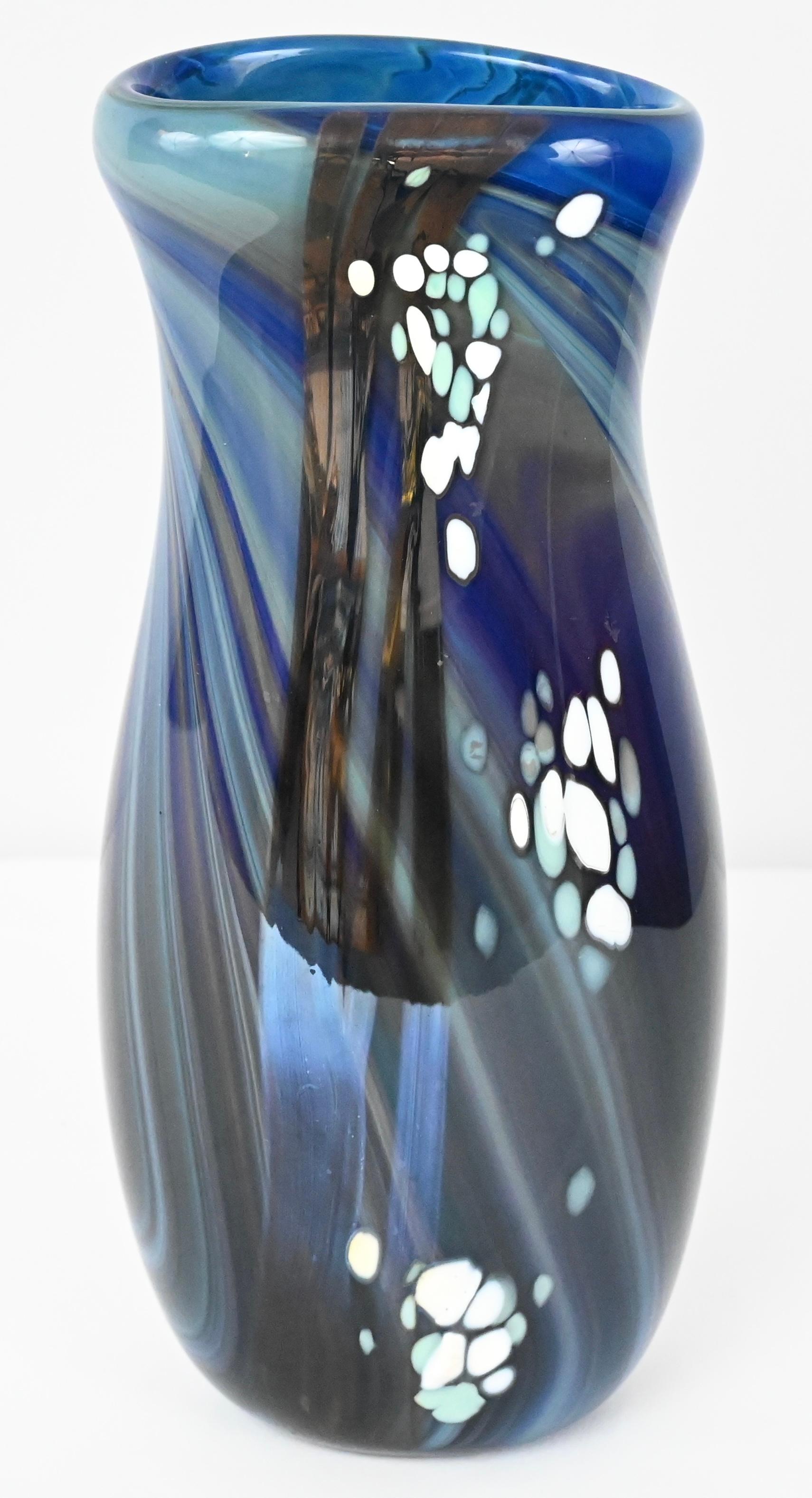 A very nice quality mid-20th Century art glass flower vase. This lovely hand blown Murano art glass vase is marked Swispot and dated. Hand-blown using Murano art glass, speckled, natural pattern of irregular sized white spots on variations of cobalt
