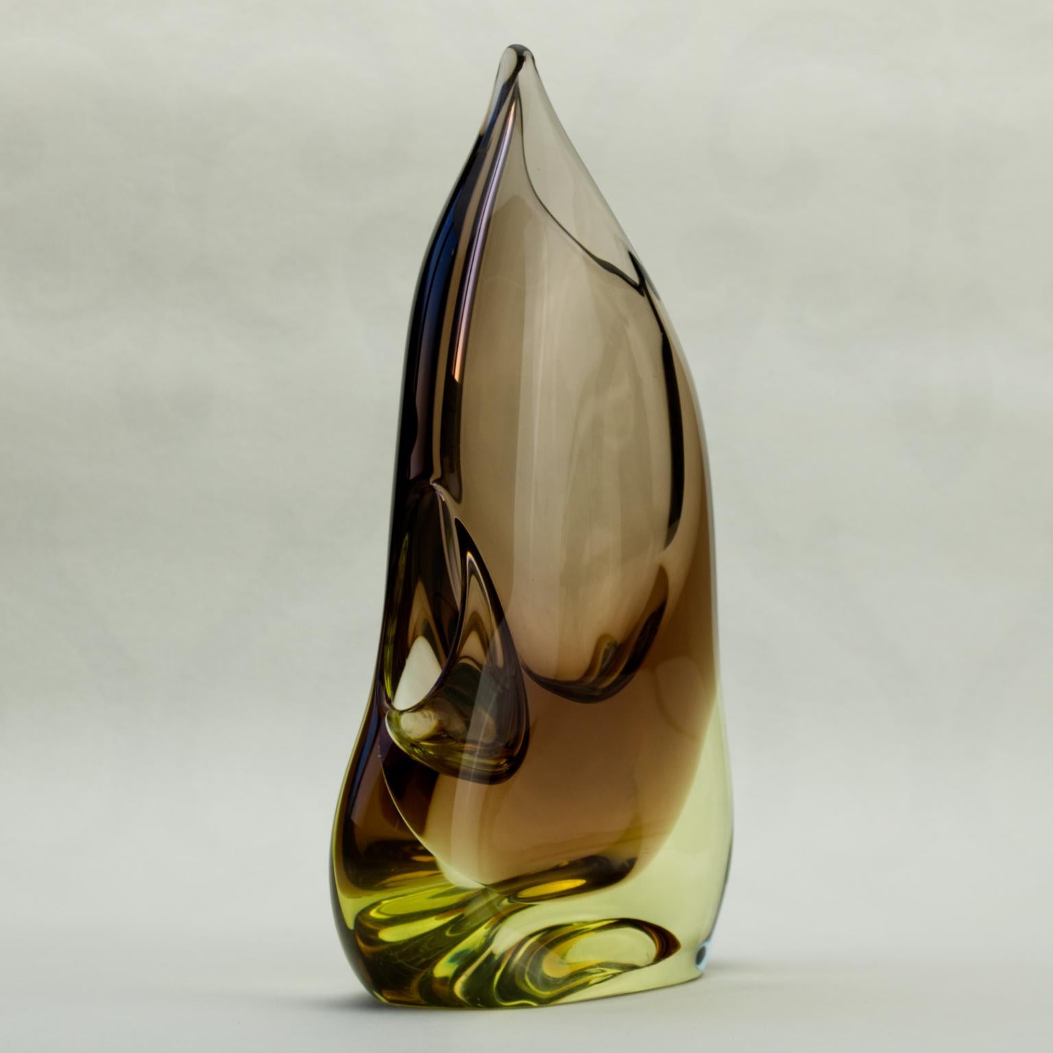 A stunning Czech organic glass vase, made in amber and yellow/citrine glass. Made by the Zelezny Brod glassworks, also known as Železnobrodské Sklo (ZBS), and designed by Miloslav Klinger in the 1960s. A vase from this range is shown in the book 