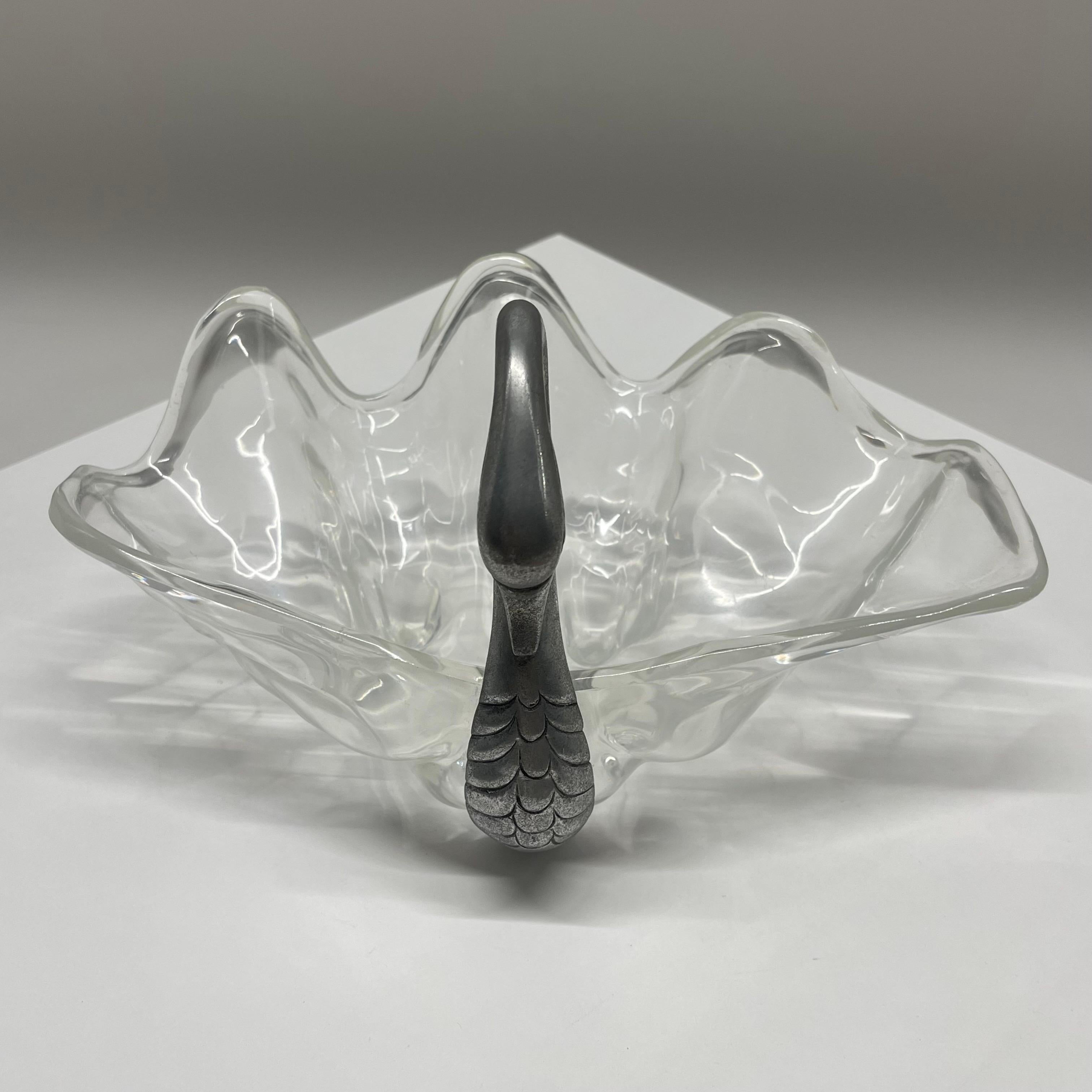 Whimsical serving piece in the shape of a swan with a shell bowl body. Rendered in aluminum for the swan and acrylic lucite for the shell body. By Arthur Court, USA, circa 1970s.