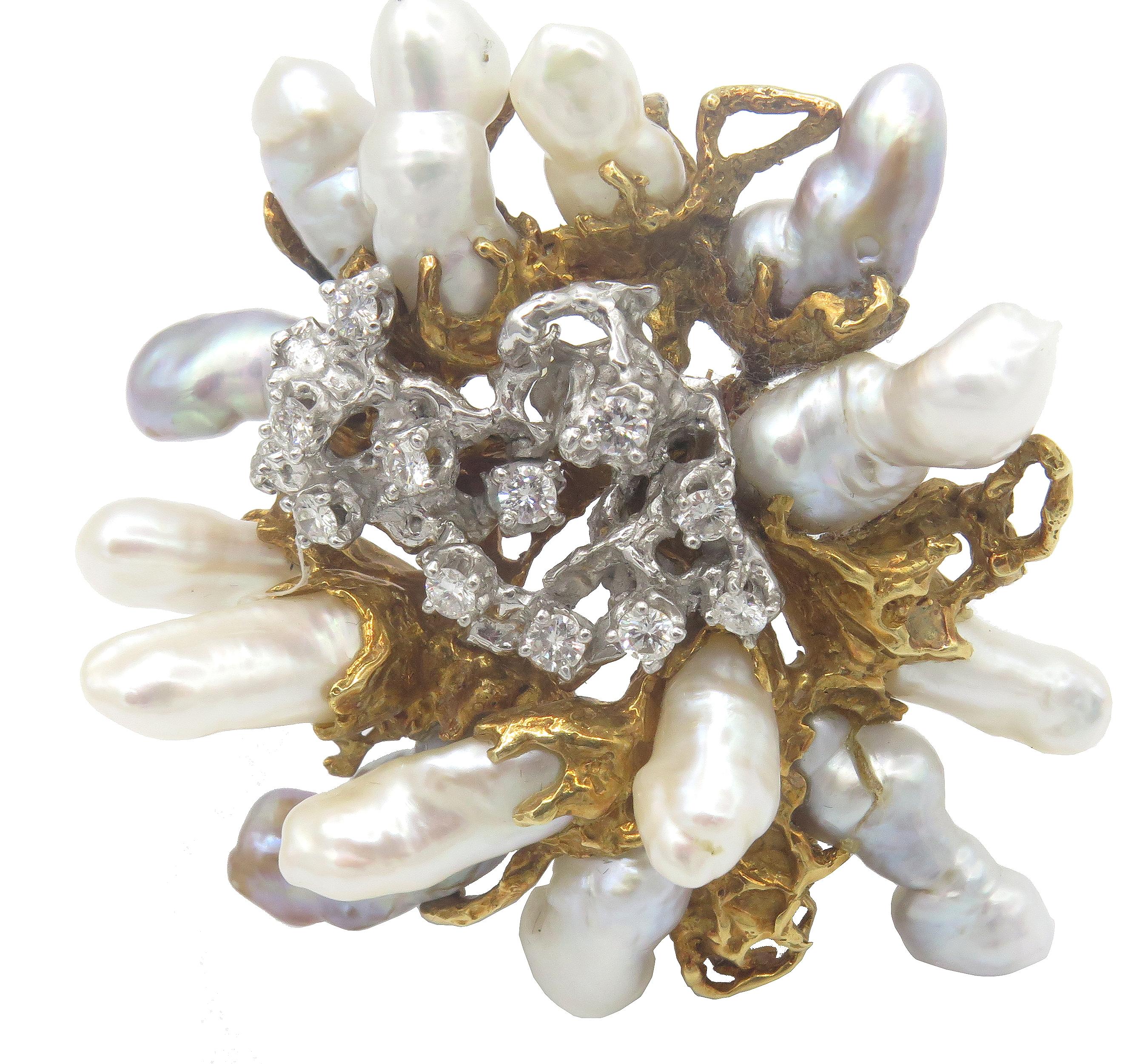 This exceptional freeform brooch designed by famed jewelry designer Arthur King artfully combines beautiful and lustrous Japanese Biwa pearls set in 18 karat yellow gold and diamonds scattered in a mass of Freeform white gold. A truly iconic brooch