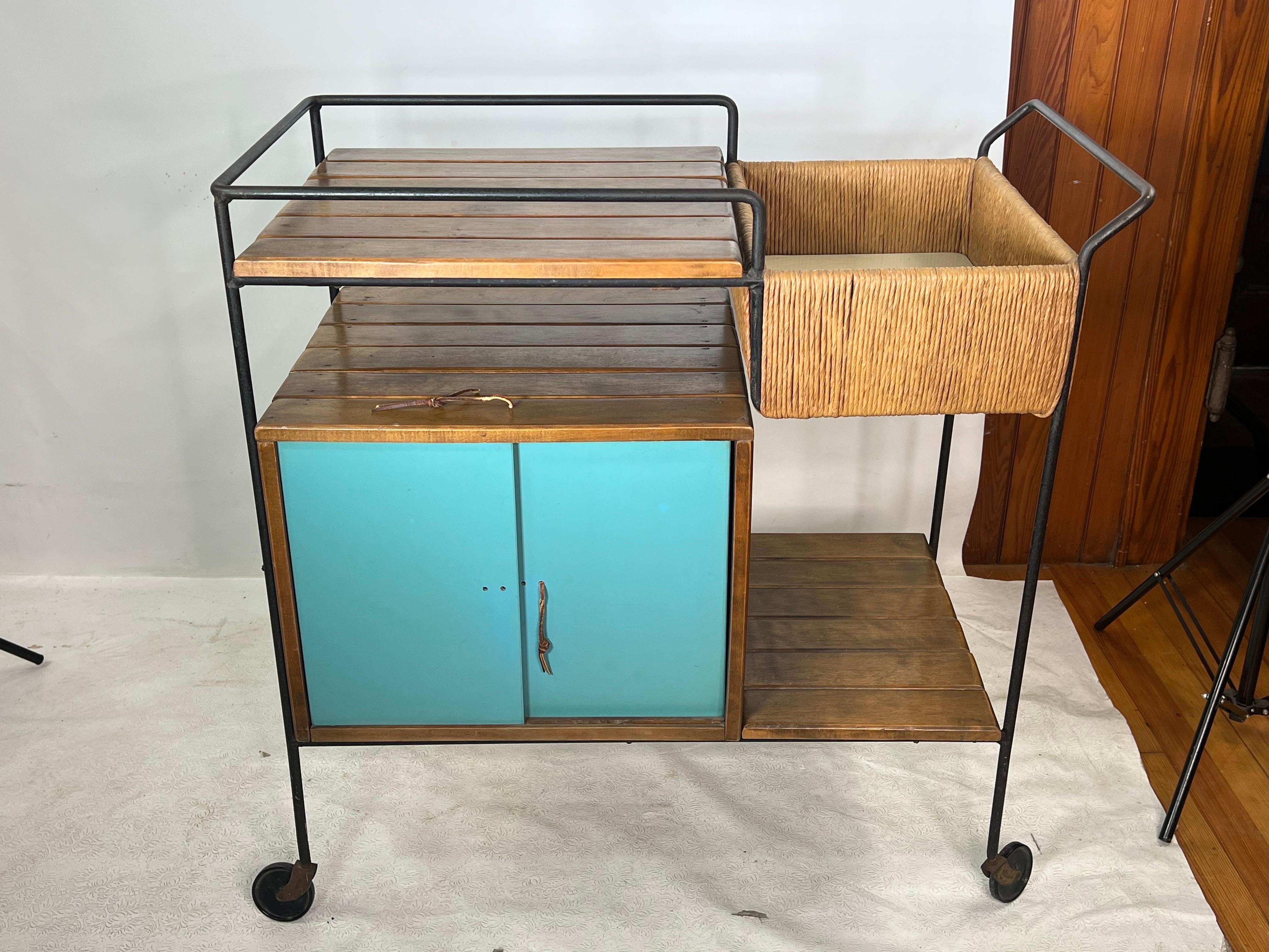 For sale is this very unique bar cart designed by Arthur Umanoff for Raymor. The original tag is missing.