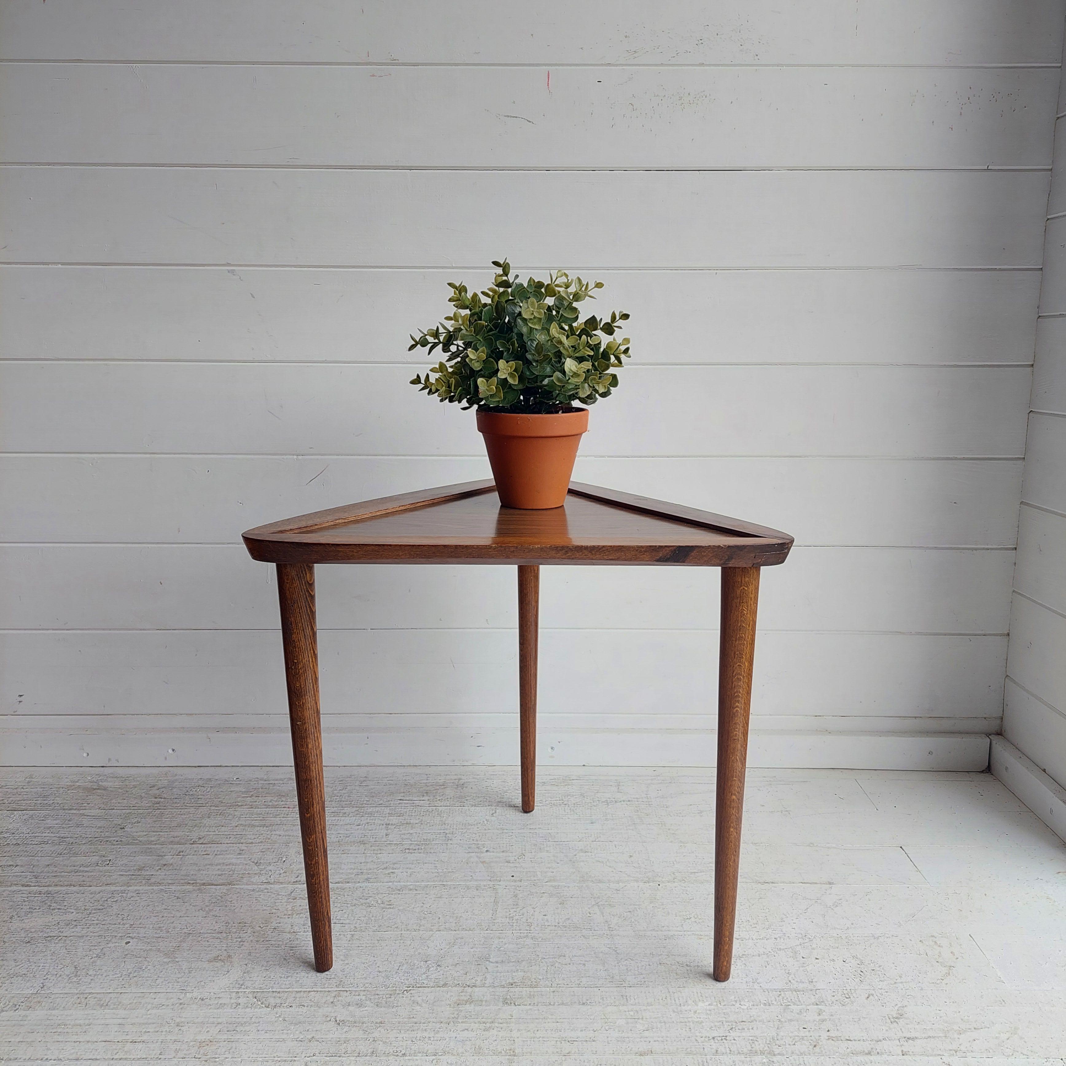 50/60s MCM Vintage Corner Table / Plant Stand- Teak w/ Wood Effect Top - Mid Century Occasional Triangular Coffee Table - Triangle Side Table

A fabulous  side table in triangular form. 
Featuring walnut legs and table top frame with a Formica wood