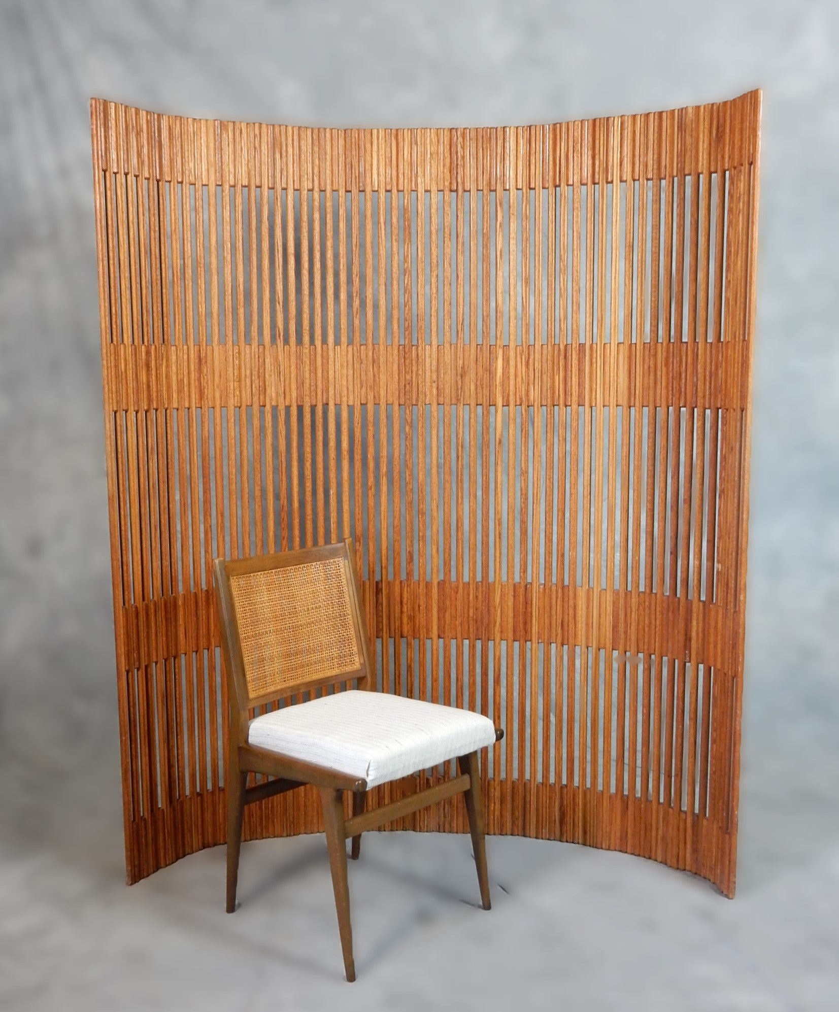 Vintage articulated paravent screen in the style of Baumann France. 
Flexible Paravent made out of strips of wood allows the screen to be placed in different shapes and angels. Adroitly constructed of solid oak with no sign of connectors or