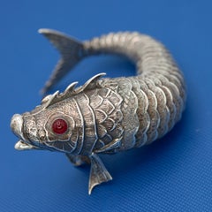 Mid-Century Articulated Silver Fish Sculpture with Red Glass Eyes
