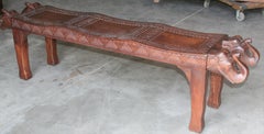 Midcentury Artistically Carved Thick Seat with Elephant Heads on Either Side