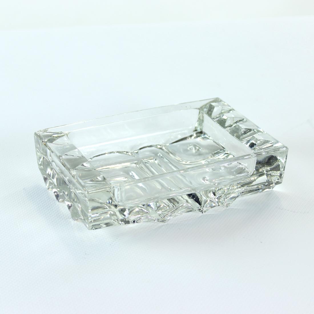 Beautiful mid-century ashtray produced from pressed glass. Designer is Vladislav Urban who produced this model as a part of his psychedelic collection where he started to use the sculptural characteristics of glass for dayly use objects. These