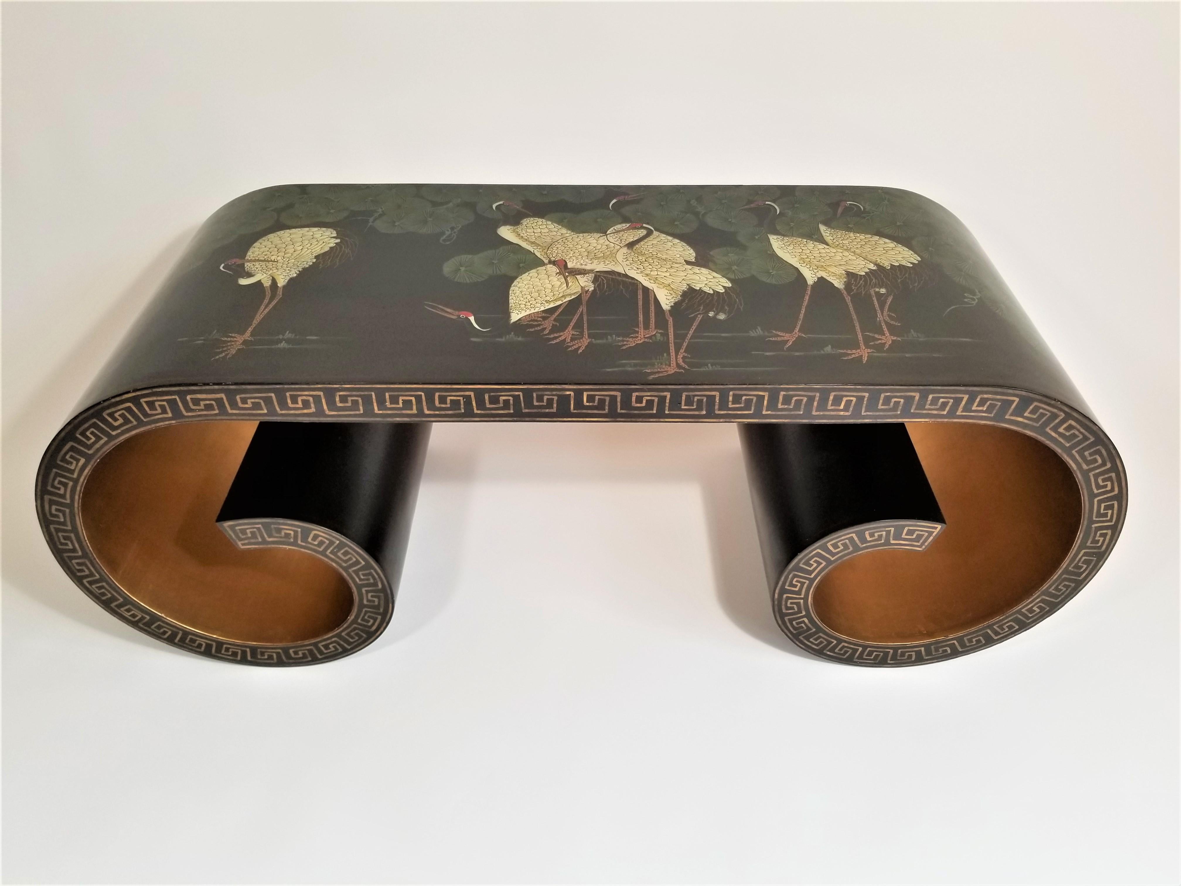 Stunning rare unique midcentury scrolled coffee table Asian influenced design with Greek key design. Gilded / Gilt accents and interior. Could also make a unique bench. This piece does show some wear consistent with age and use. 
Complimentary