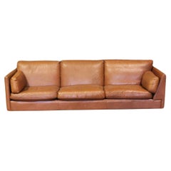 Mid Century asymetrical sofa in brown leather, scandinavian style