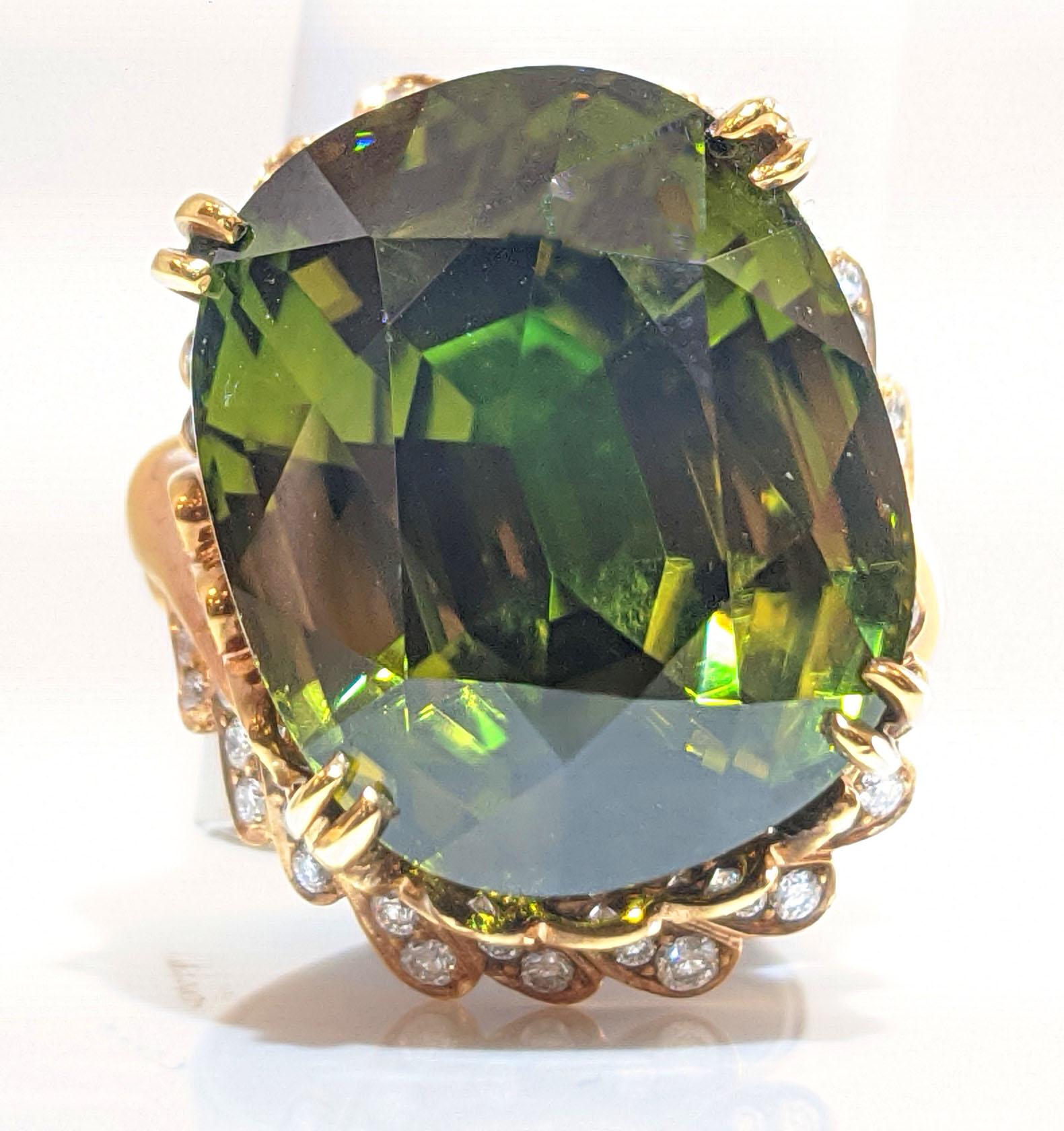 This unbelievable green zircon is rare at 10 carats, hard to find at 20, and irreplaceable at 45 carats! The scintillation and sparkle in this stone are truly breathtaking. Most would assume you had the sister stone to the Dresden Green! Zircon has