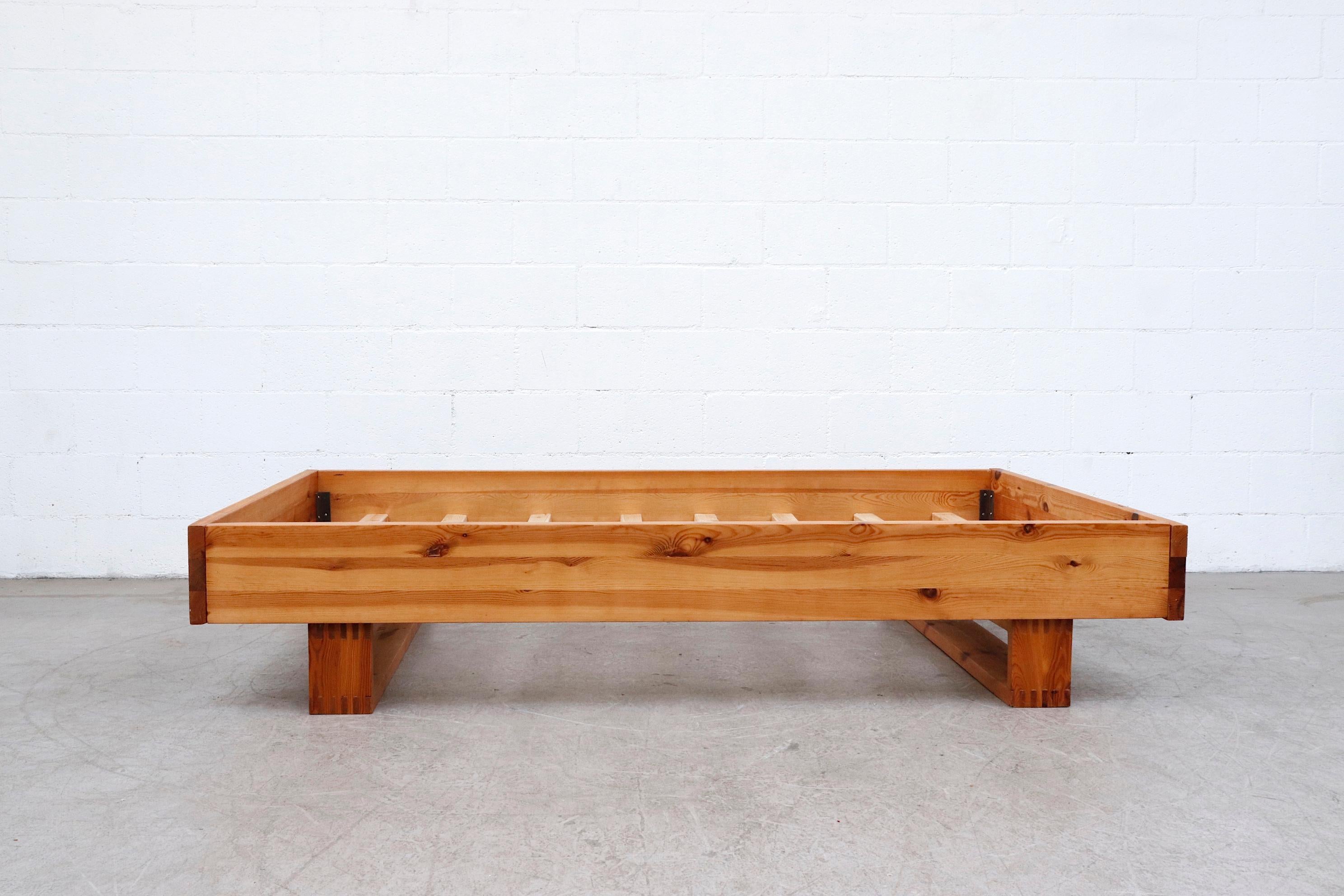 Low and Sleak Ate Van Apeldoorn full size platform pine bed frame with natural wood slat supports. Frame is lightly refinished with wear consistent with it's age and use. Other Apeldoorn bed frames available. Inside mm are 55