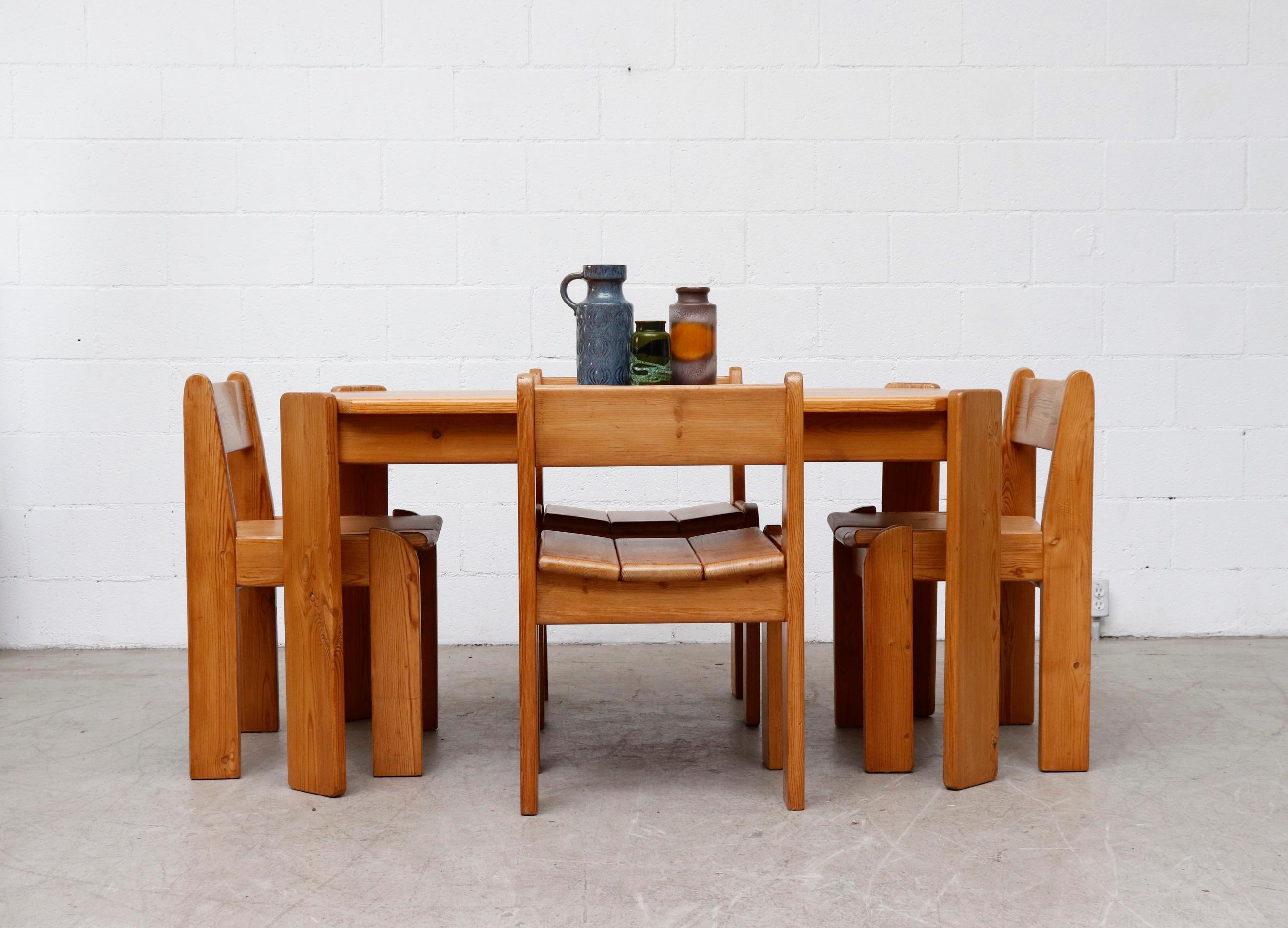 Mid-Century Ate Van Apeldoorn style pine wood dining table with clipped corner top and angled slat legs. In Original condition with some moderate wear and scratching consistent with age and use. Shot with Ate Van Apeldoorn pine dining chairs (S439