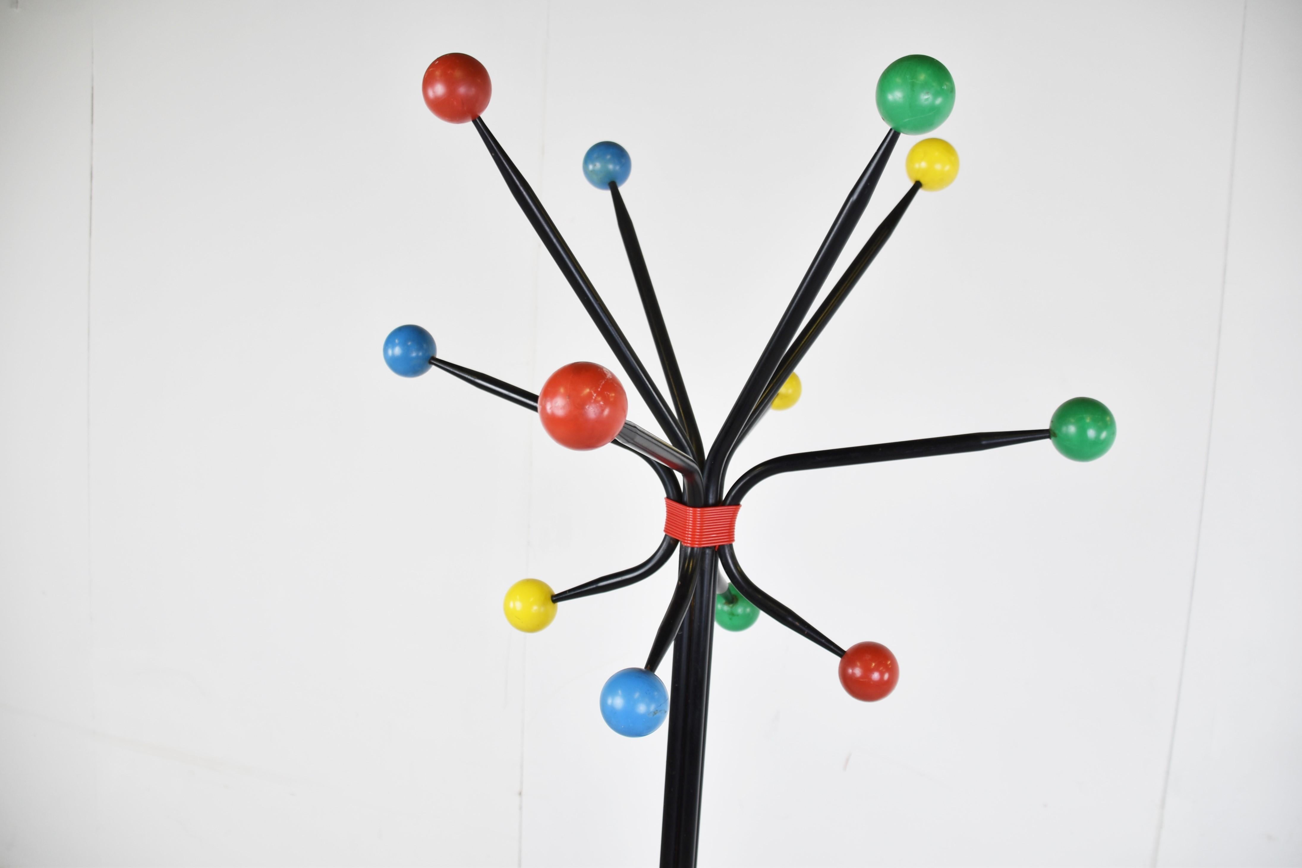 Fabulous  XL modernist multicolour atomic coat stand.

This remarkable coat stand has 12 coloured wooden balls.

Suitable for hats, coats, etc...

It is a statement piece for your hallway or bedroom, it really gives a colourful twist to your