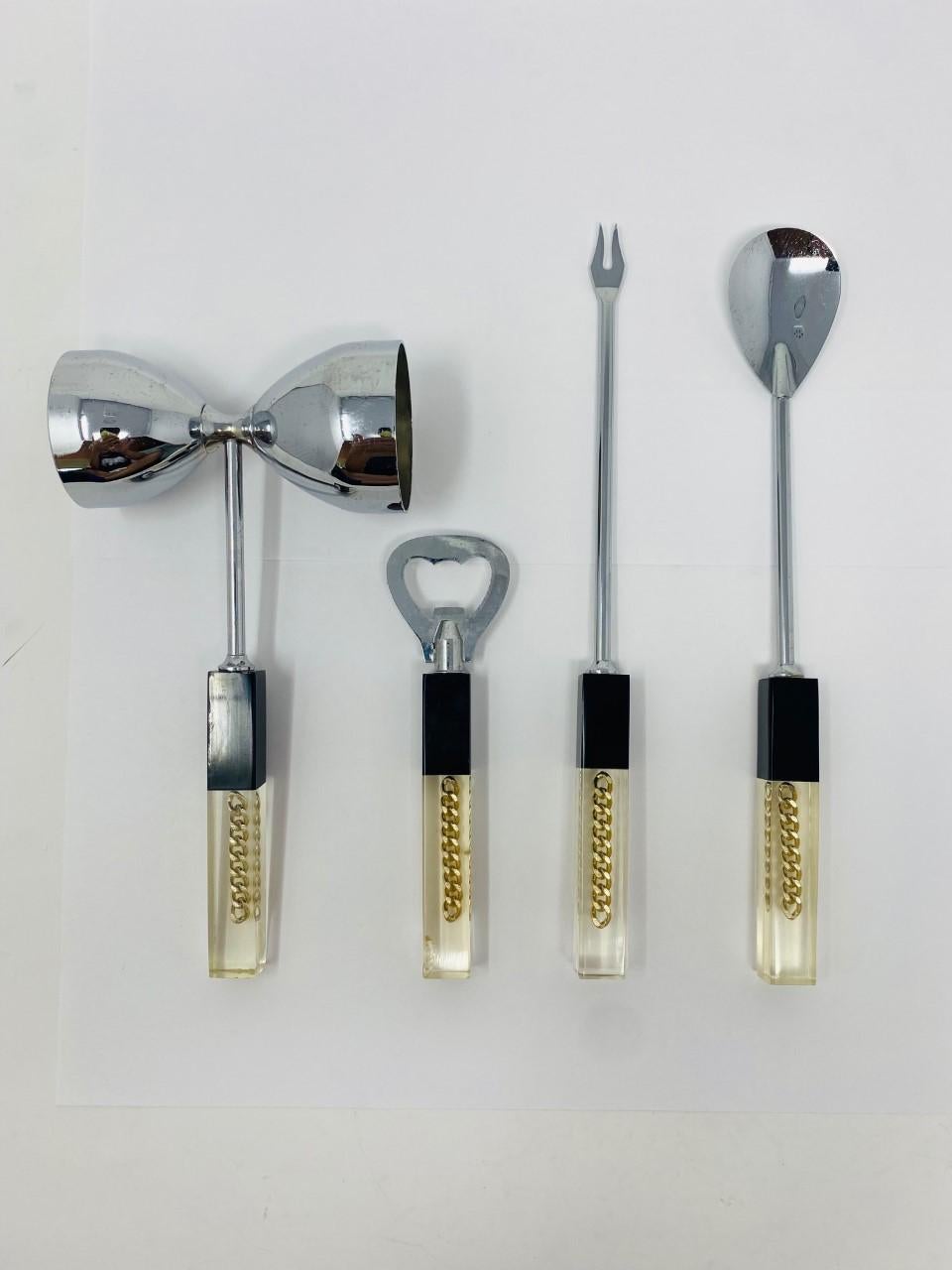 One of a kind midcentury lucite and chrome handle with stainless steel top bar tools set. This is a perfect statement piece to enhance your bar décor. It is a great piece to display on your bar or kitchen counter, on your drink cart, use at dinner