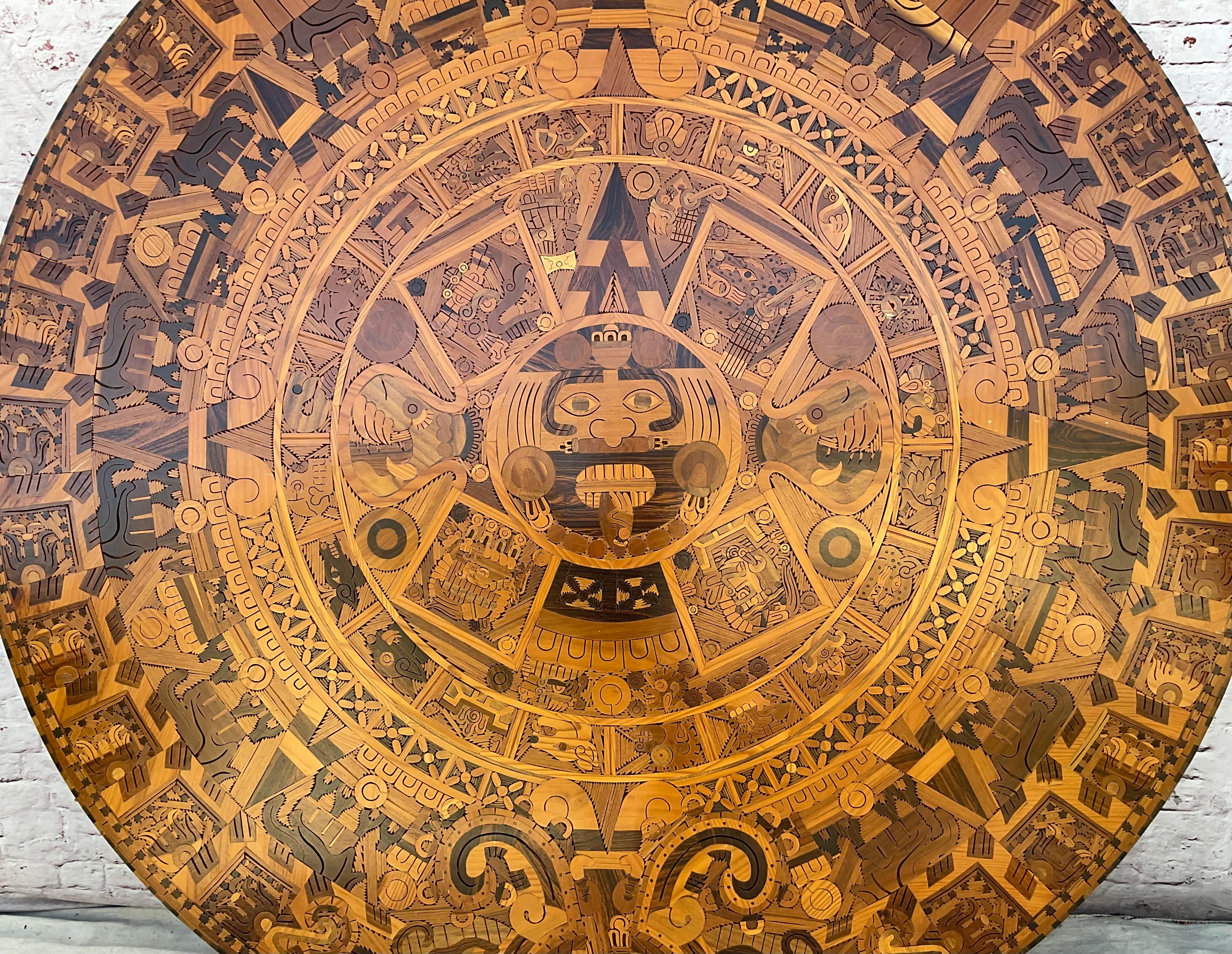 Mid Century Aztec Calendar Large Circular Inlaid Wood
Rare 72 Inch, Hand-Carved, Aztec Circular Wooden Calendar from Mexico. The calendar, or 