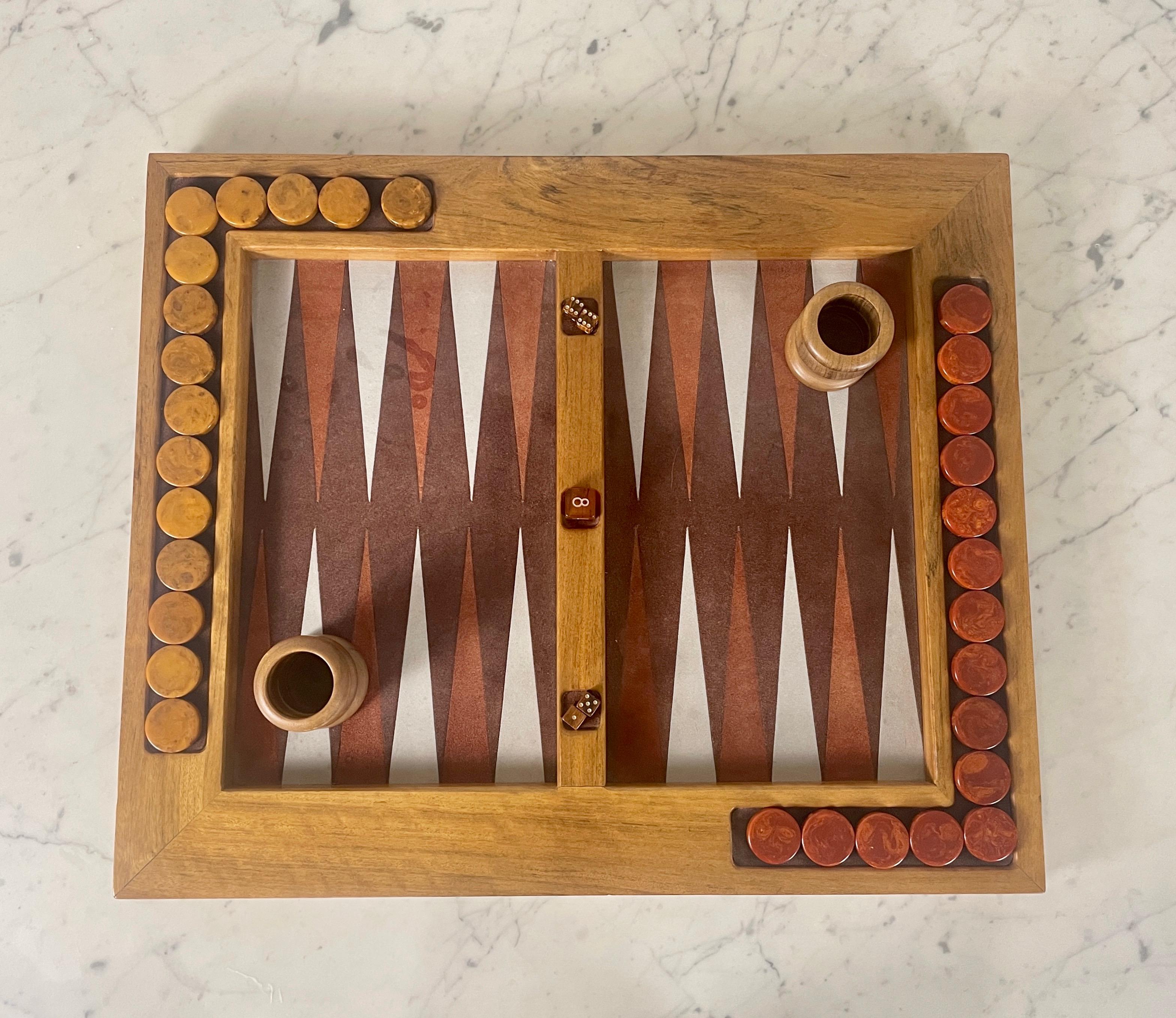 Mid Century Chestnut Backgammon Table. Mid century style game board with all the original pieces. A very unique board for all game lovers. This piece makes a great gift for any occasion! 