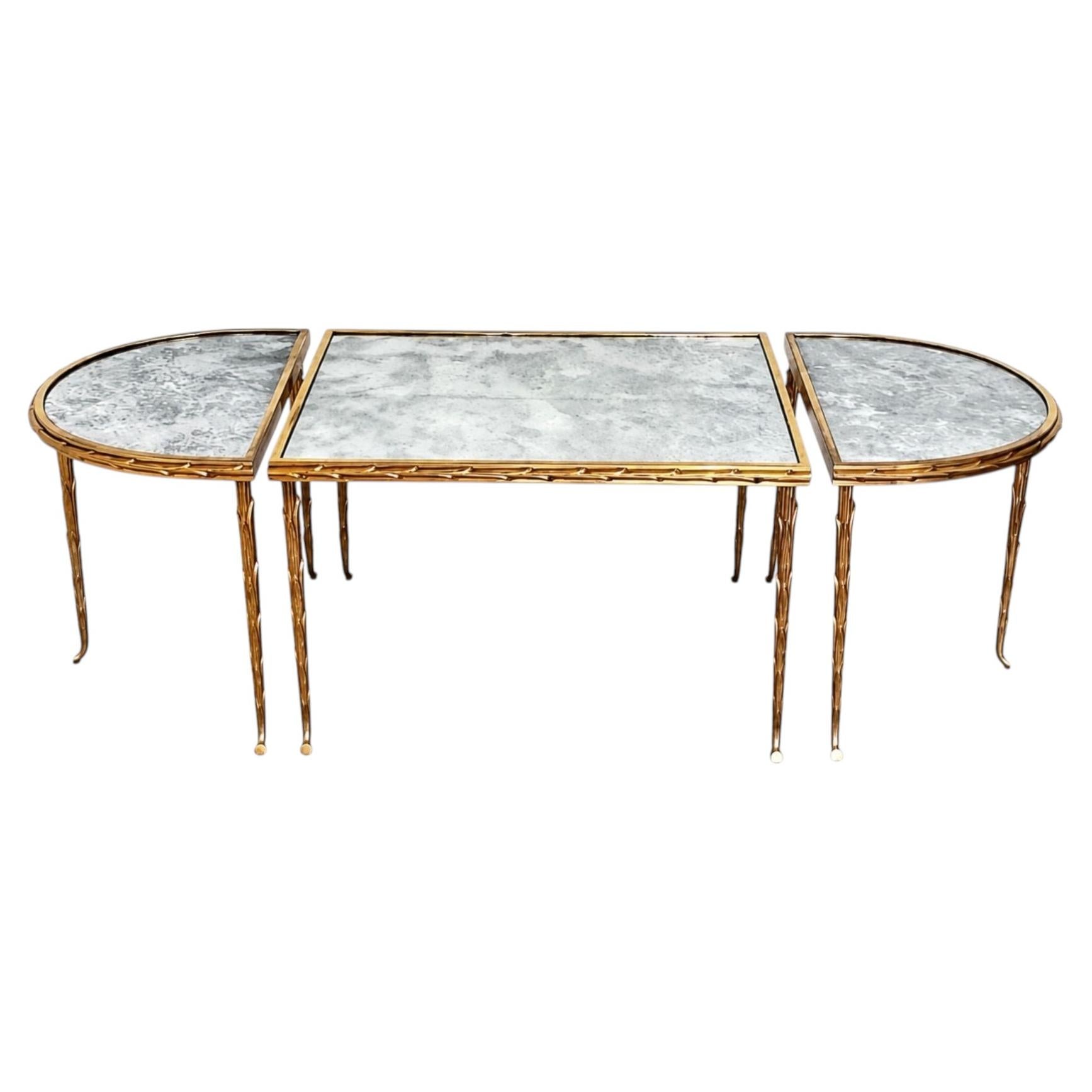 Mesa de centro «Palmier Tripartite» de Baguès, de mediados de siglo, en bronce dorado, con cristal églomisé