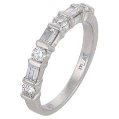 Mid Century baguette and round diamond platinum half eternity band