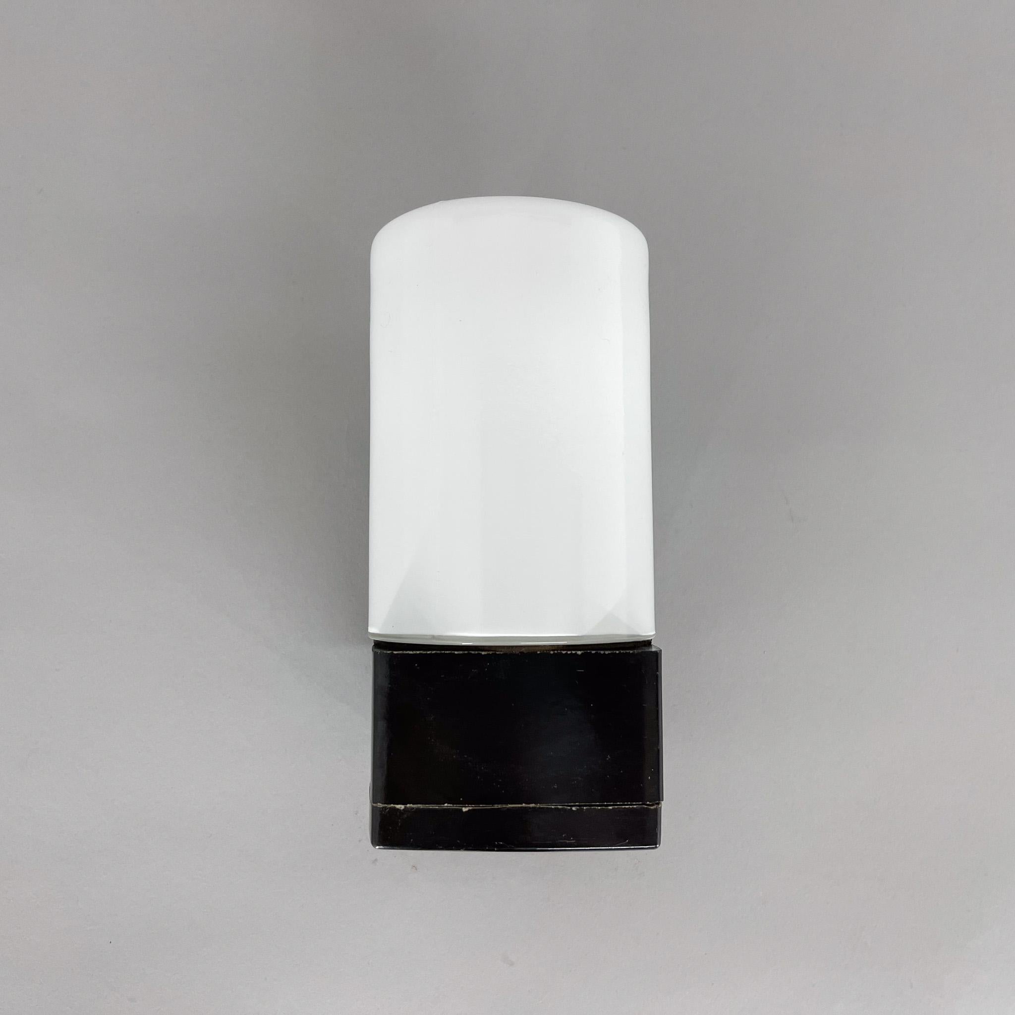 Designed in the 1960s in former Czechoslovakia. Bakelite holder and opal glass shade. Seal rubber against moisture. Bulbs E14-E15, 2x40W US compatible cable.