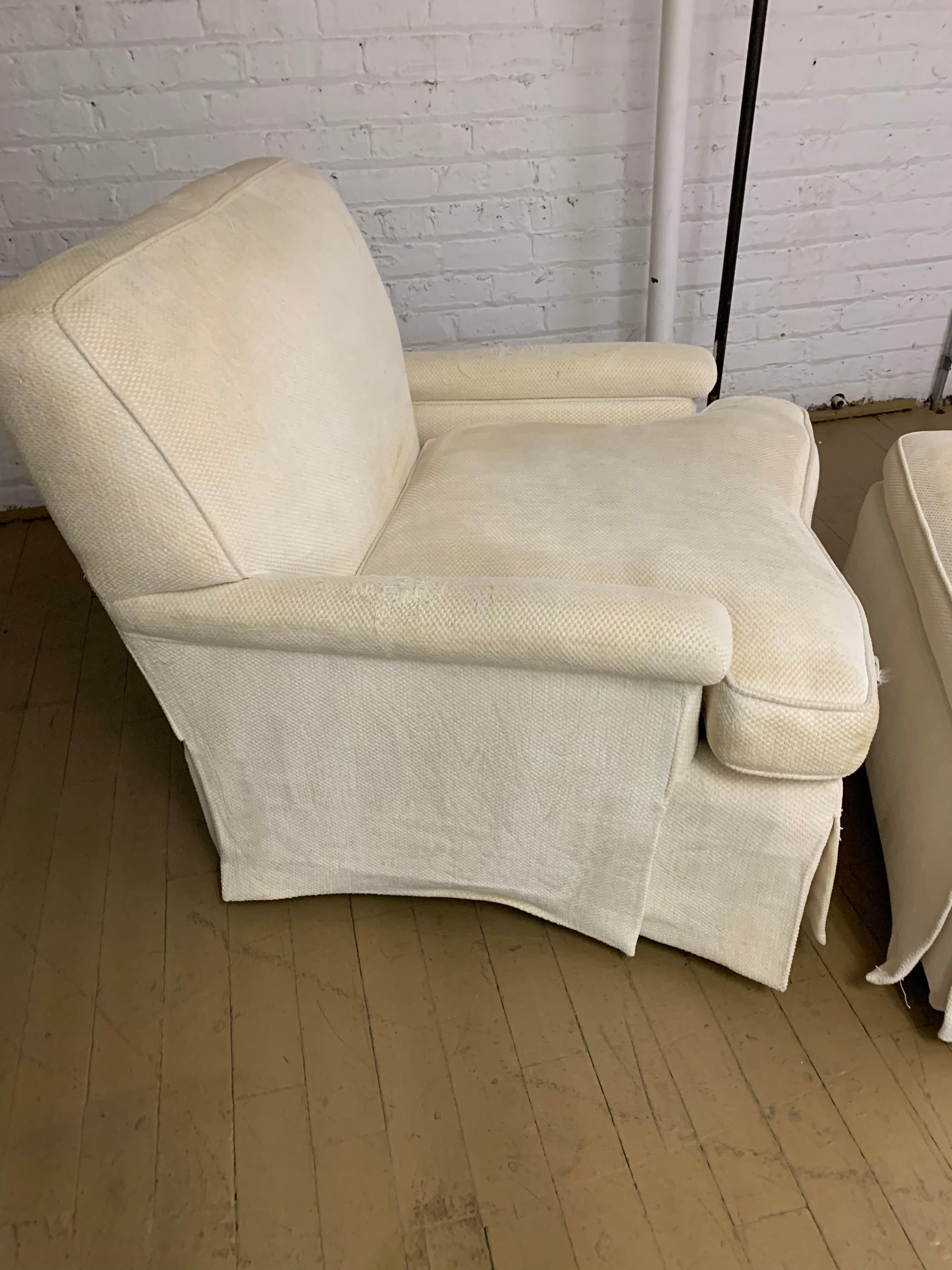 Midcentury baker armchair and ottoman 
Our living room furniture from our childhood home included this Upholstered armchair and ottoman - along with a love seat and sofa of the same aesthetic 
upholstery is white cotton blend and needs a good