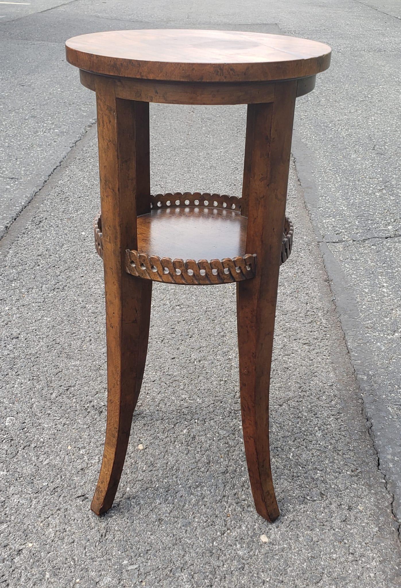 A cute Mid-Century Baker Furniture Carved and stained Walnut Candle Stand. Very sturdy.
Measures 10.5