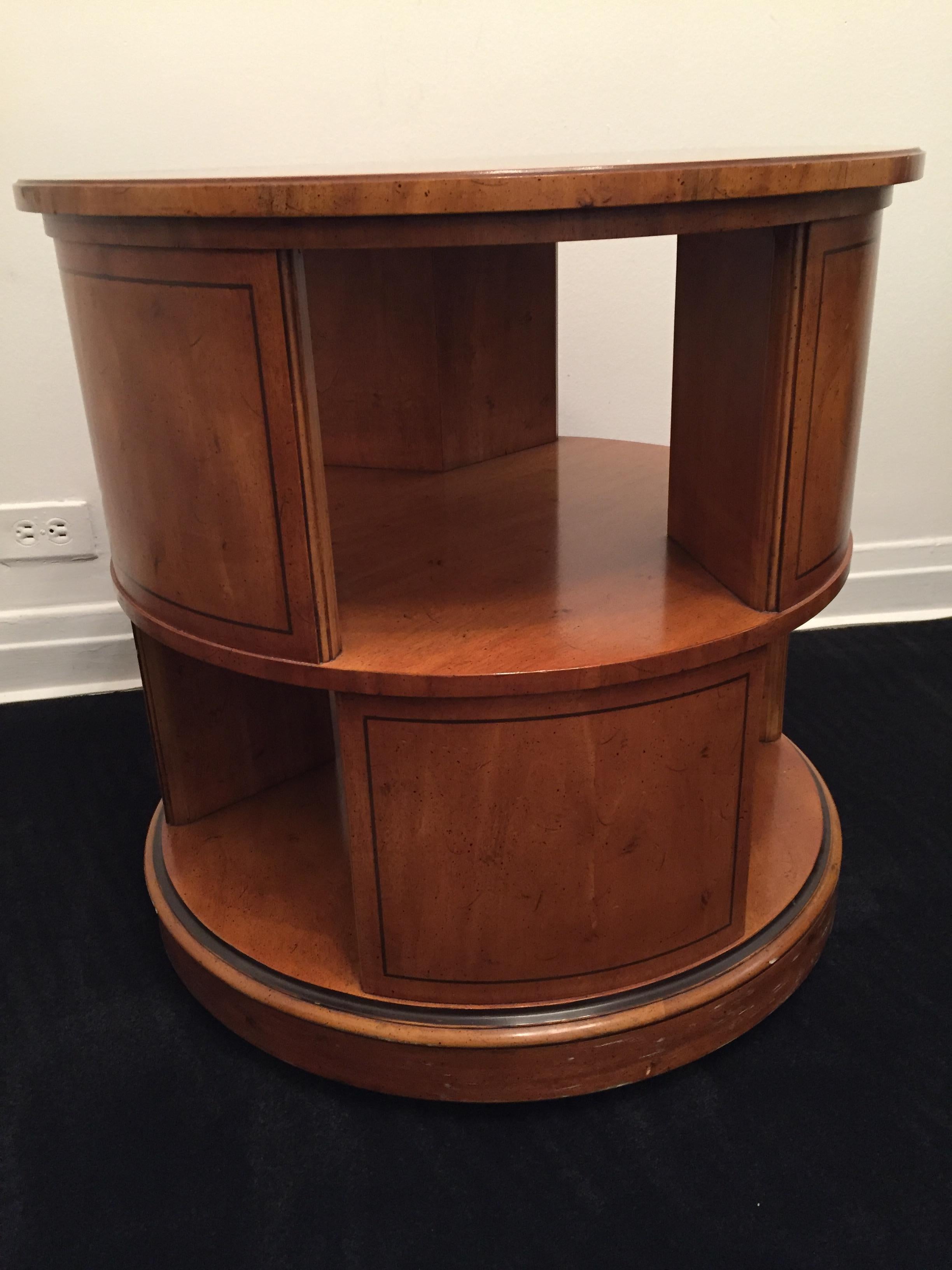 Mid-century Baker Palladian Inspired Revolving Book Case or Side Table
This burled wood, 1960s book case / side table was inherited from our grandmother.
She had incredible taste, and had this made custom to complement the Baker Palladian suite of
