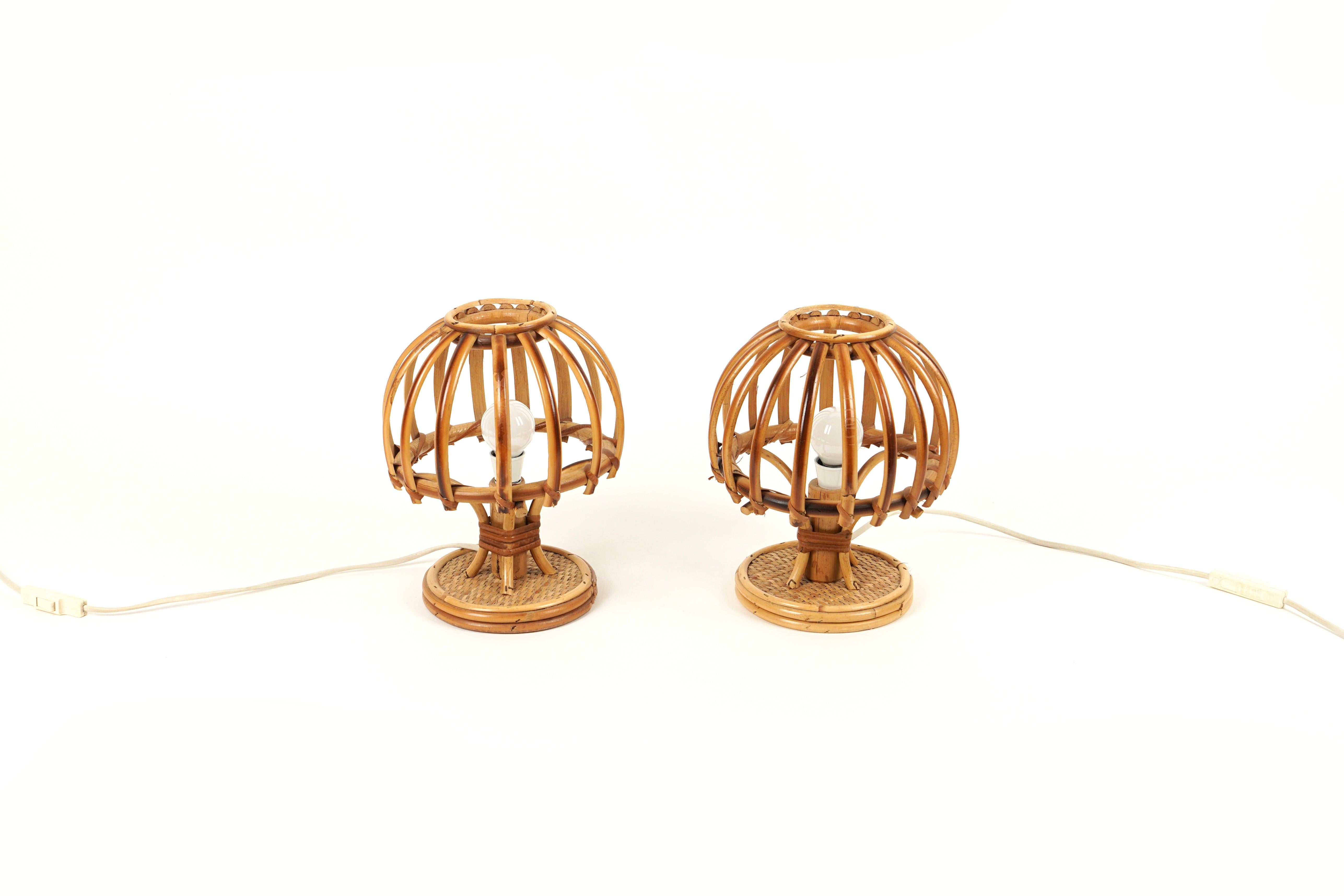 Beautifuls pair of table lamps in bamboo and rattan in the style of Louis Sognot.

Made in Italy in the 1970s.

Louis Sognot was a French designer best known for his elegant furniture made from a combination of rattan and wood. Sognot was