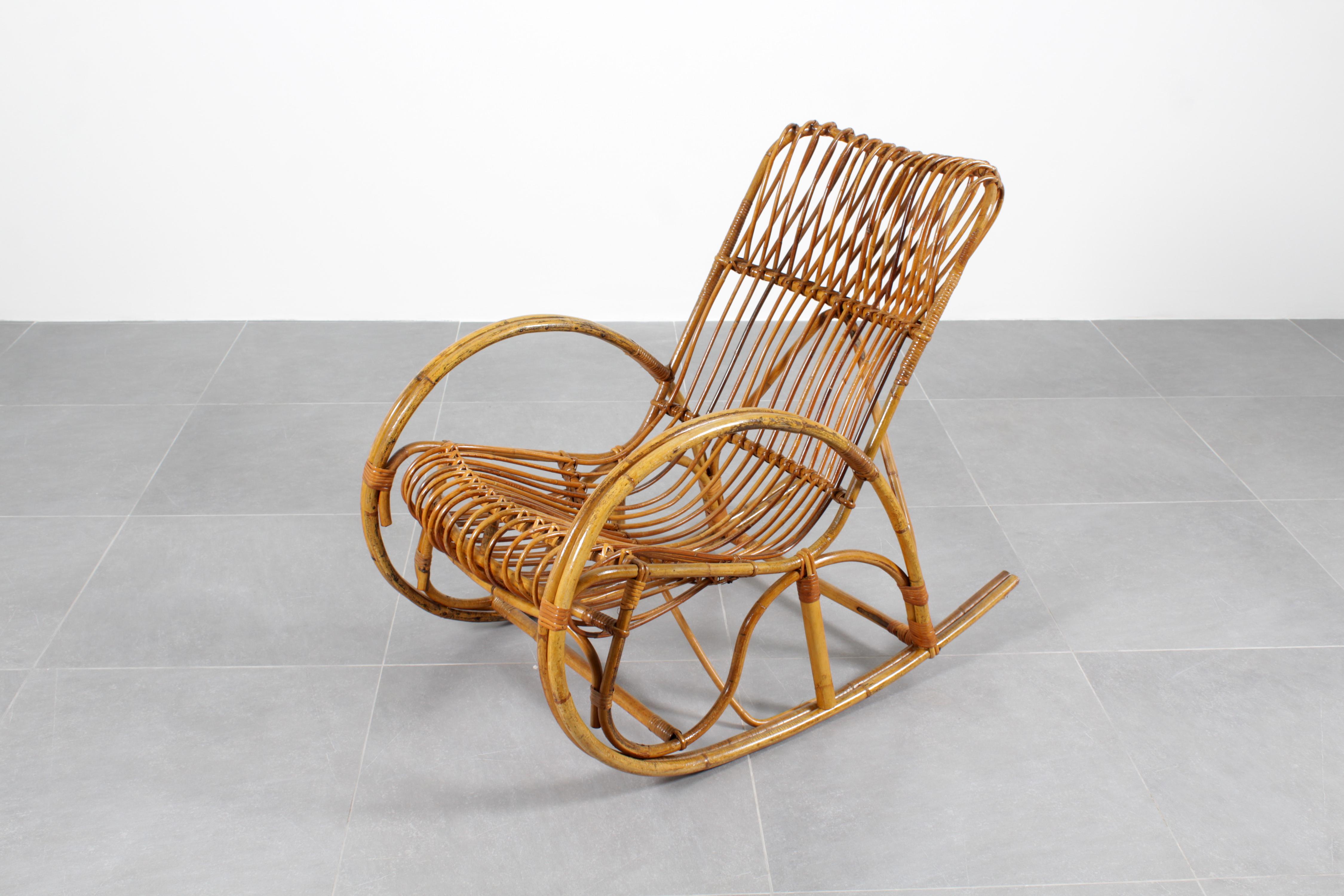 Beautiful rocking chair entirely in bamboo cane with rattan weaving connecting elements. Handmade in the style of Franco Albini, Italy 1960s.
Wear consistent with age and use.