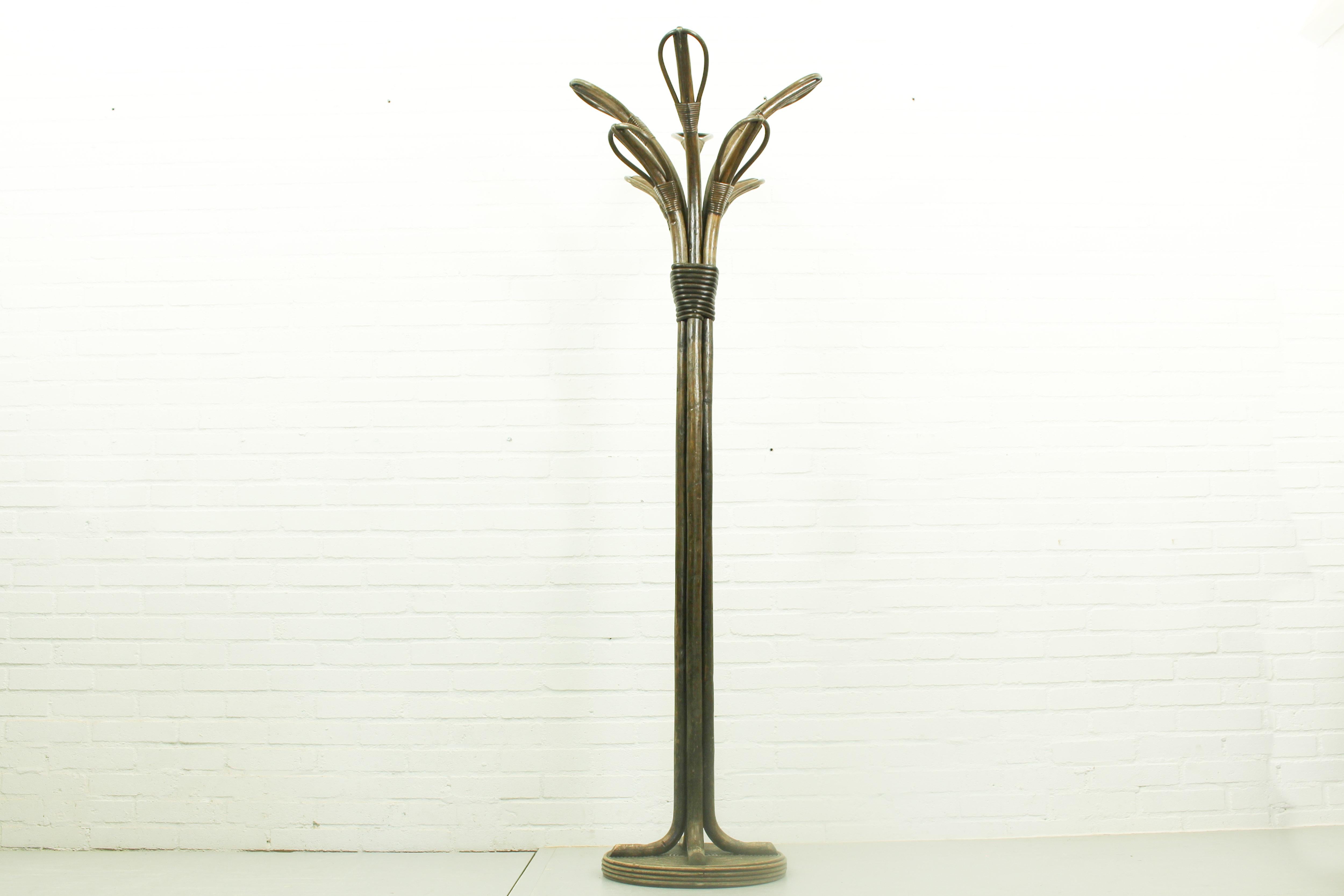 Robust brutalist bamboo free standing coat stand, circa 1960 France. 

Dimensions: 173cm h, 57cm w, 57cm d.

