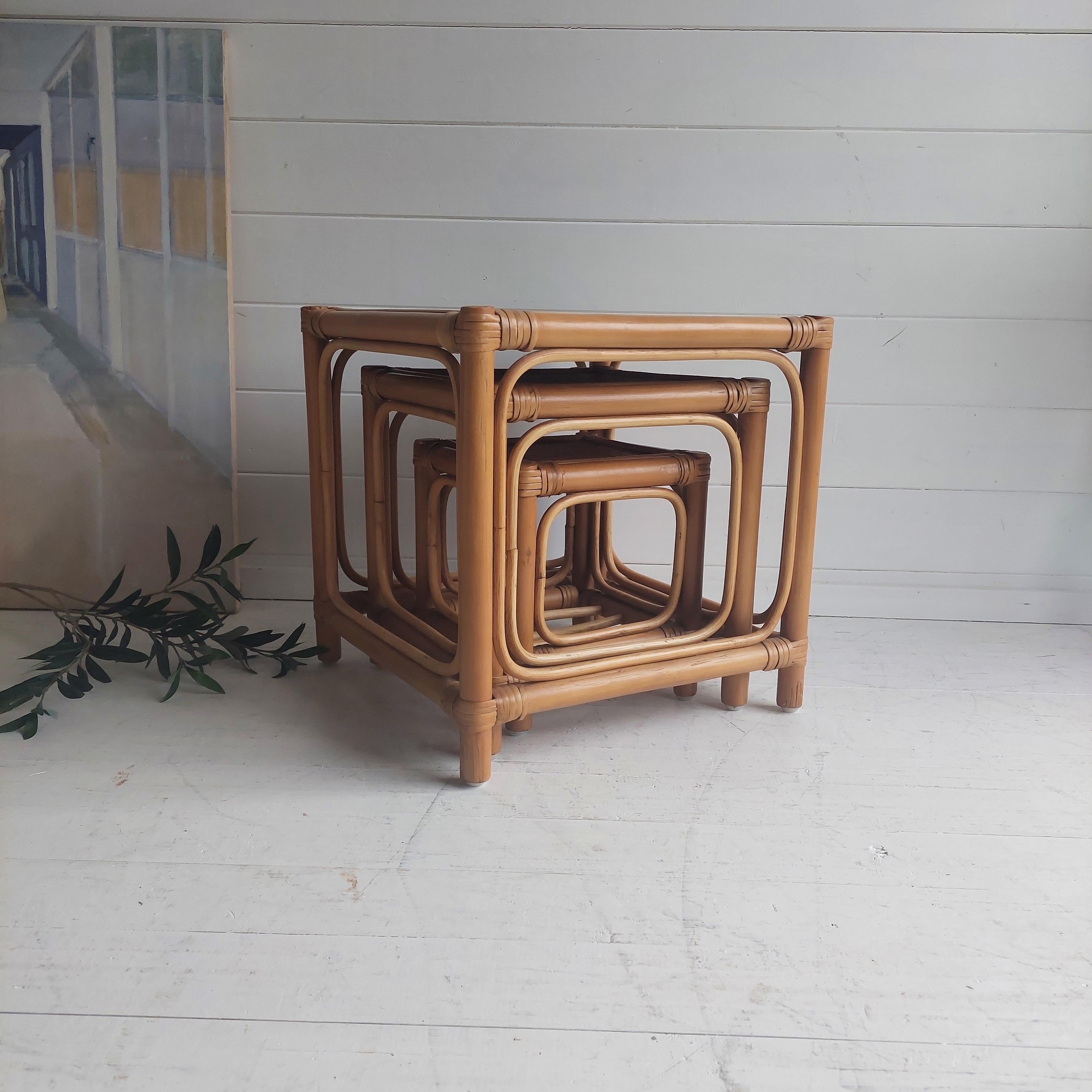 Vintage nest of tables
Quality set of Mid Century bamboo nesting tables. 
Three graduating cubed bamboo tables, stylish retro chic look for today's Mid Century Modern living.
An original vintage mid-century nest of bamboo tables. Great looking