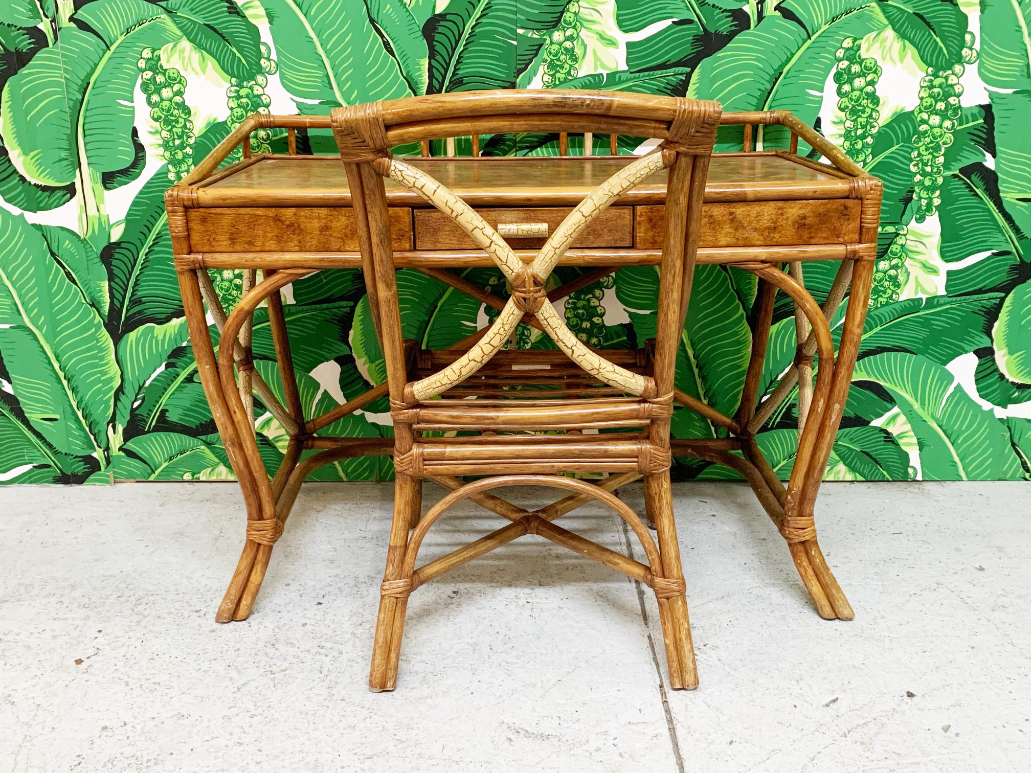 Vintage bamboo and rattan desk from the Philippines features gated top and splayed legs, along with a unique two-toned finish. Good vintage condition with minor imperfections consistent with age.
Desk measures 43