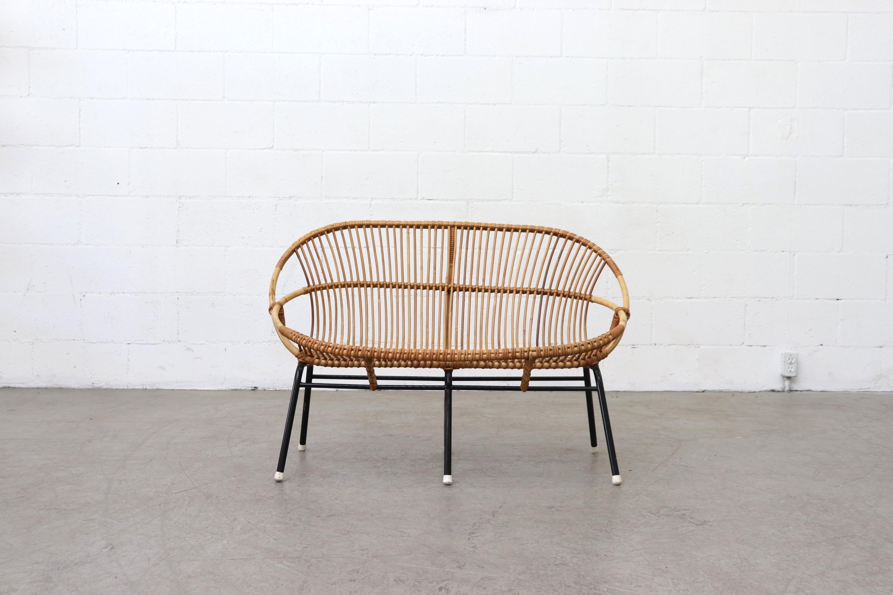 Mid-Century Bamboo Love Seat with Black Enameled Metal Frame and White Rubber Feet. In Original Condition with Some Signs of Wear Consistent with Age and Use. Other Matching Chairs Available and Listed Separately.