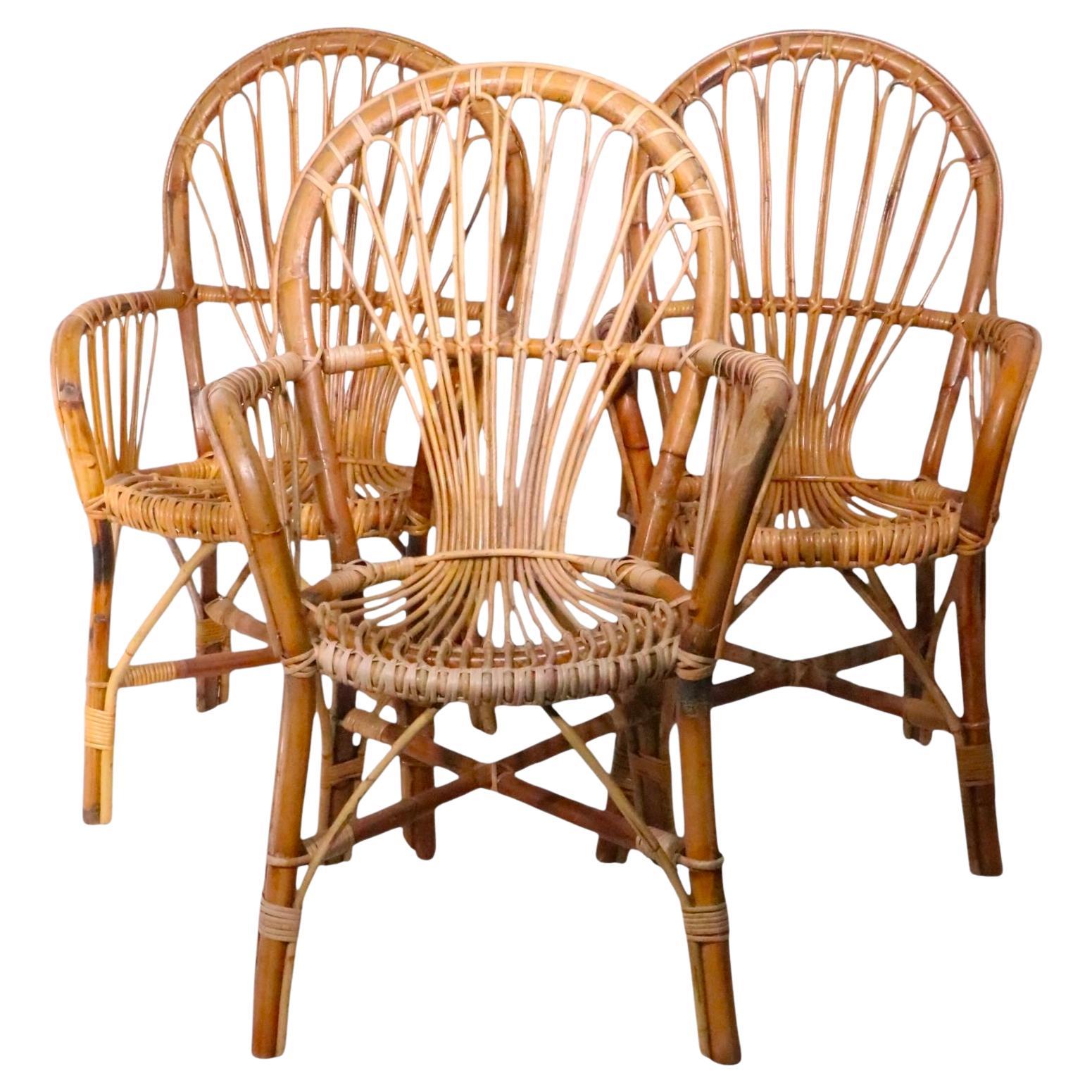 Mid Century Bamboo Reed Arm Chairs c. 1970
s möglicherweise in Italien hergestellt 3 verfügbar