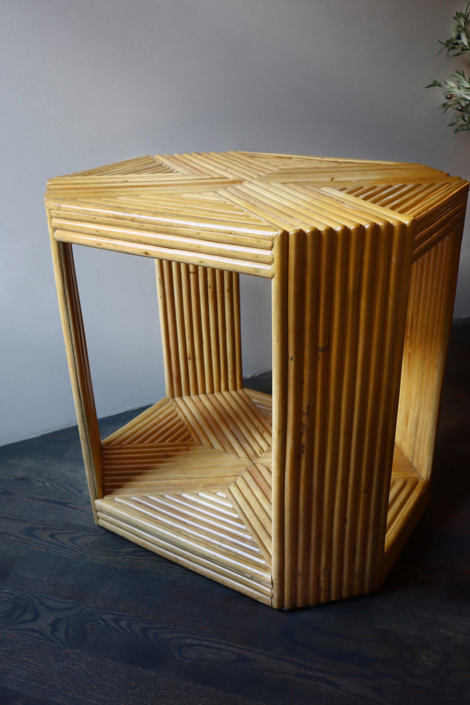 Bamboo reeded side table with X pattern.
